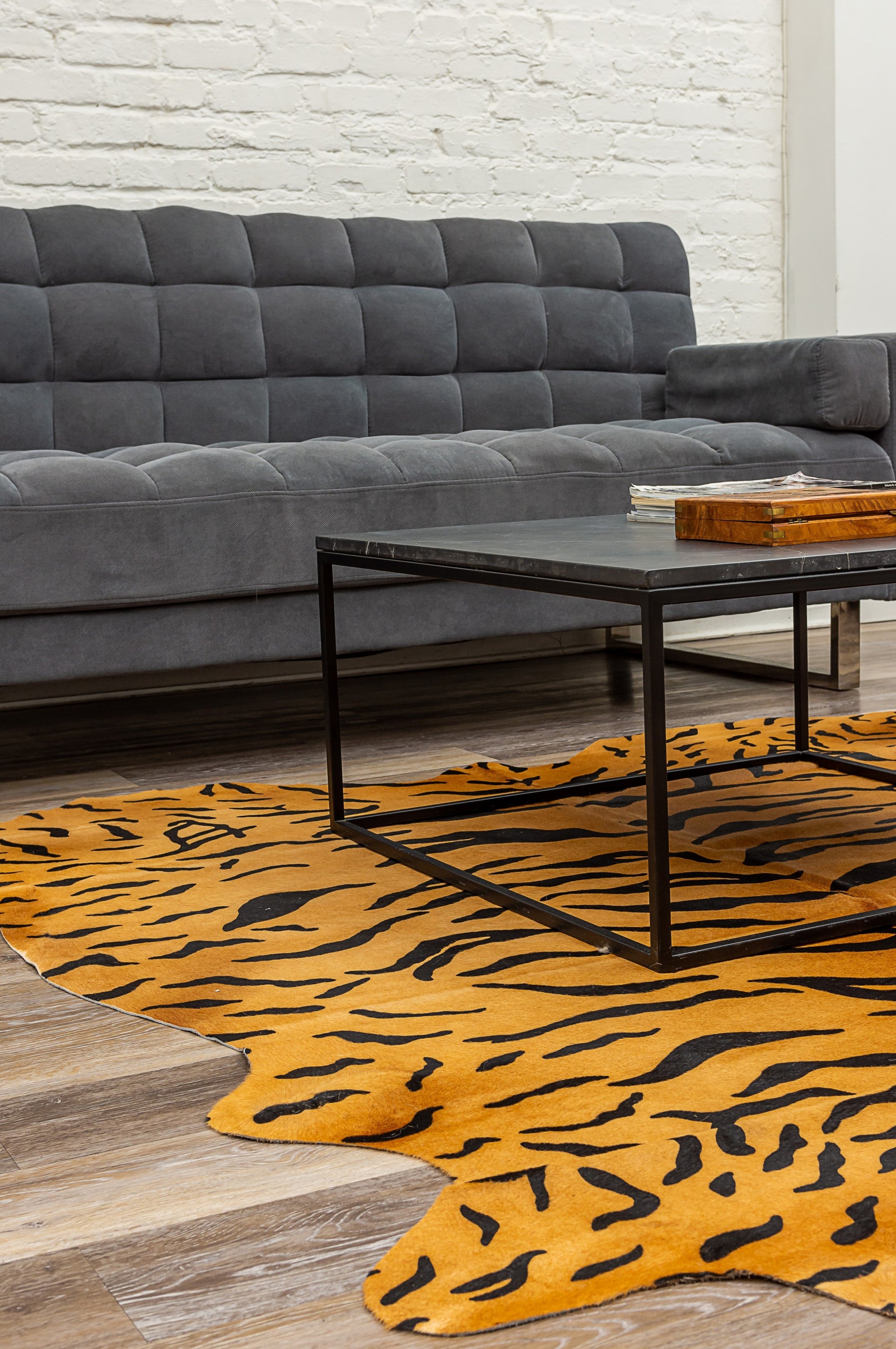 Luxurious 72x84 Tiger Chocolate Natural Cowhide Rug showcasing rich colors and unique patterns, perfect for enhancing home decor.