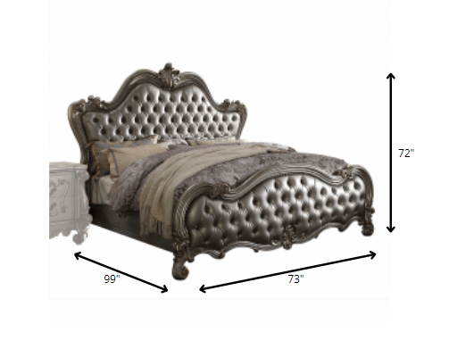 Luxurious 73x99x72 inches Silver PU Antique Platinum Upholstery bed set featuring carved scrollwork and tufted upholstery.