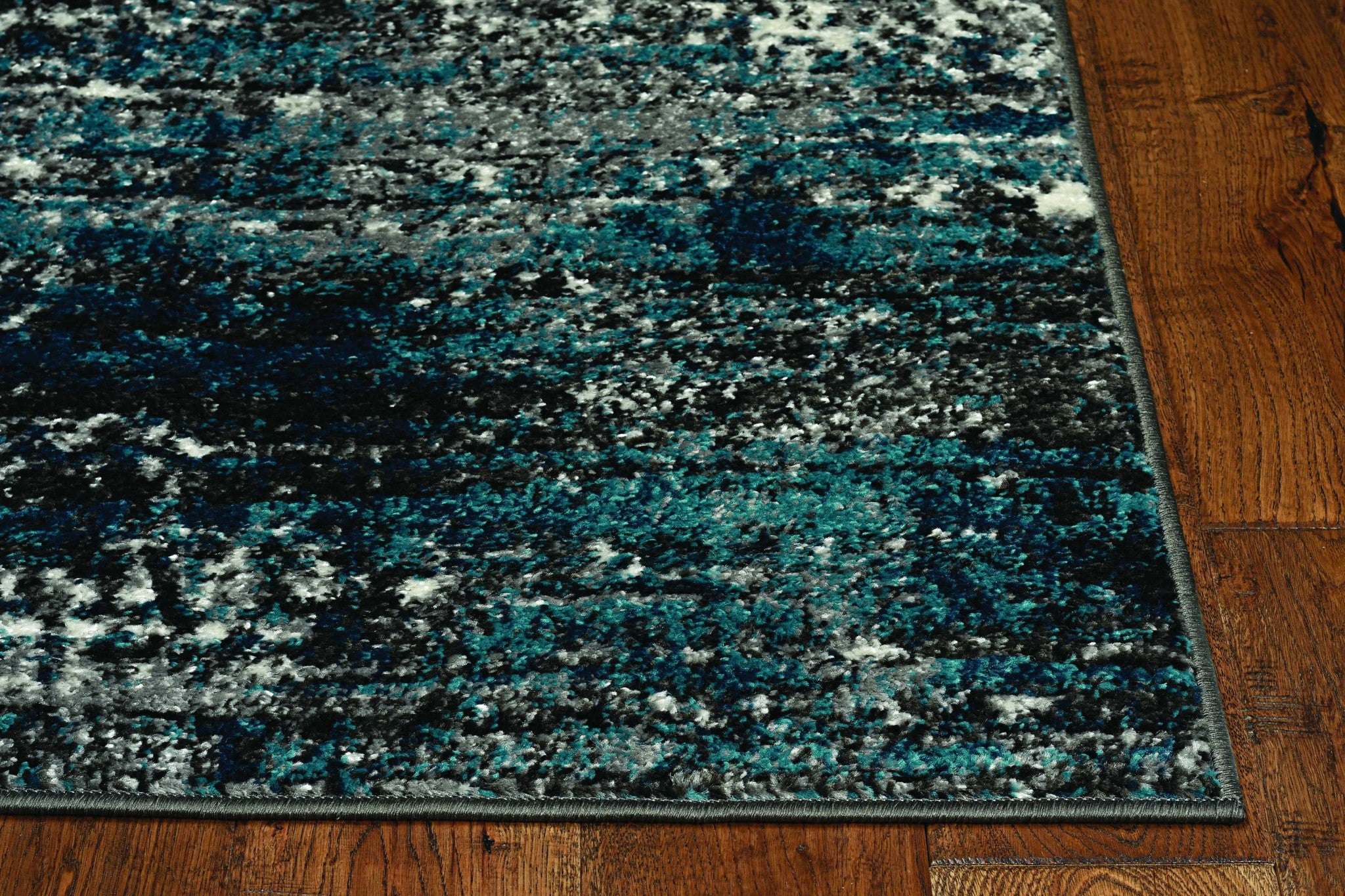 7-inch grey blue machine woven abstract indoor runner rug, showcasing a modern design with rich colors and bold patterns.