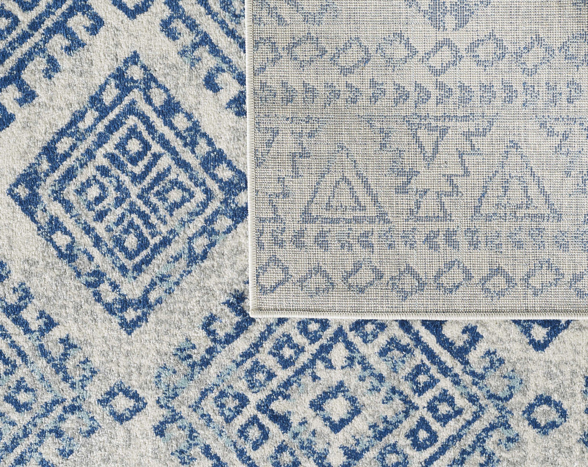 7-inch ivory blue machine woven distressed geometric indoor runner rug, showcasing a modern design with soft textures.