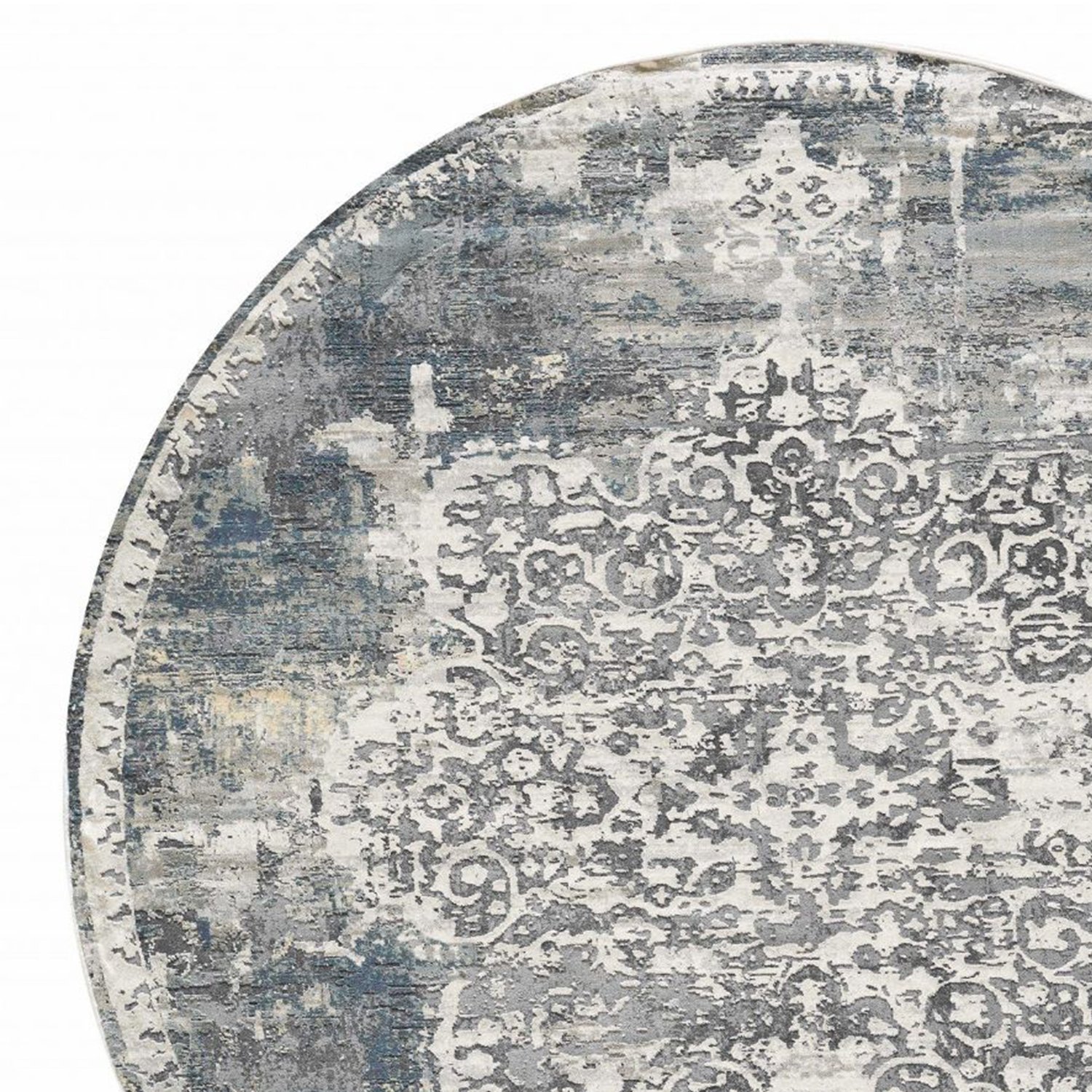 A 7-inch round ivory area rug made of polyester, showcasing a contemporary design suitable for various interior styles.