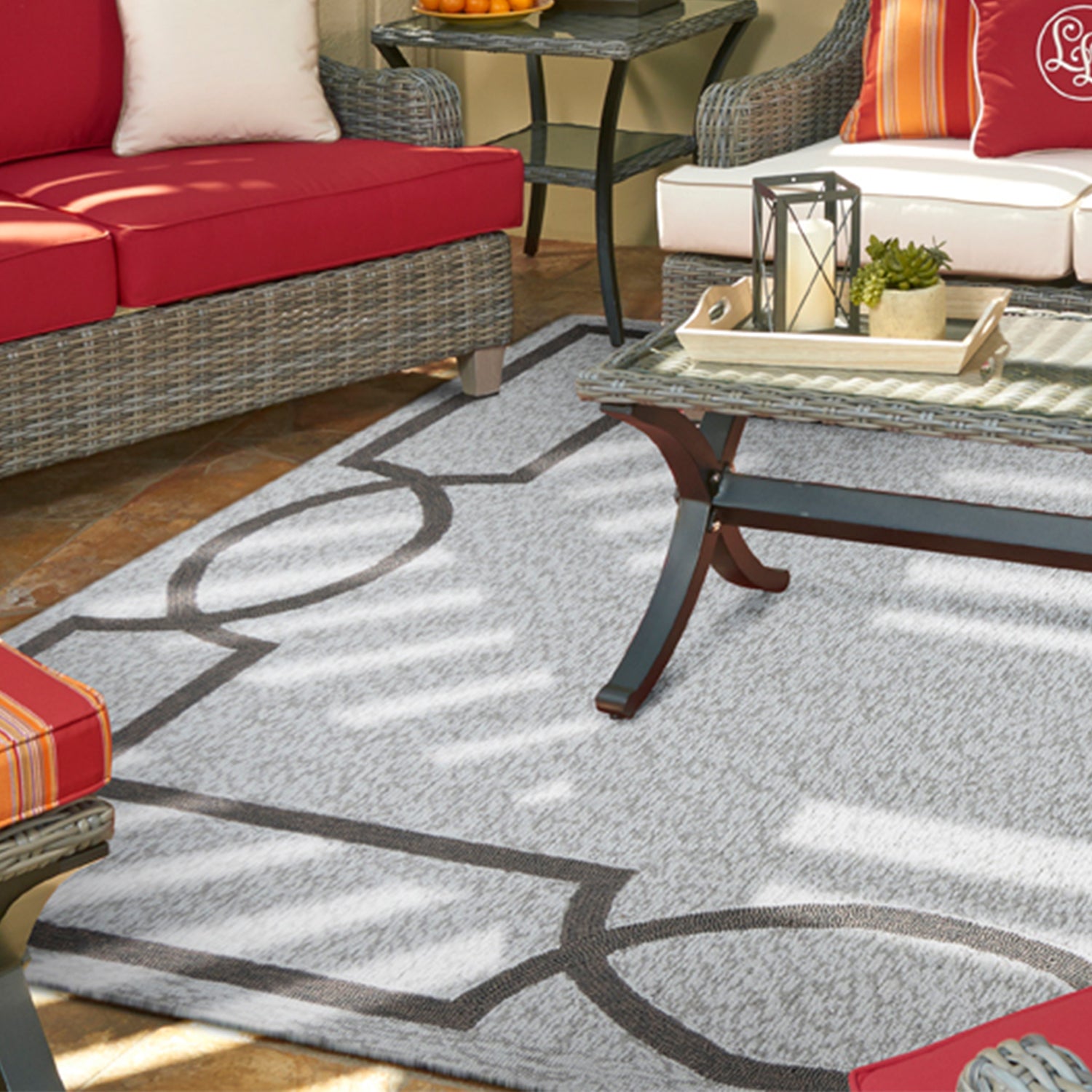 7-inch square UV treated polypropylene oatmeal area rug, showcasing a contemporary design suitable for indoor and outdoor use.