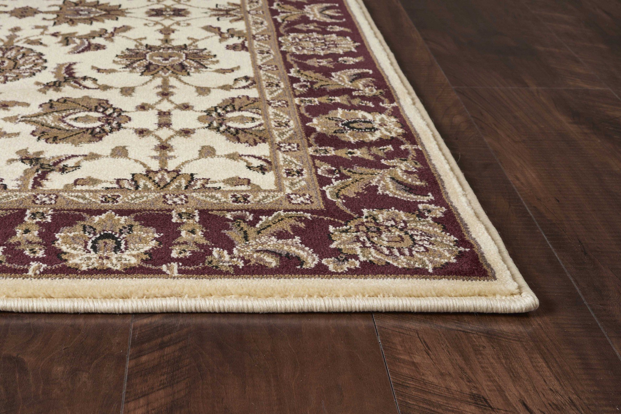 7 inches x 10 inches Polypropylene Ivory/Red Area Rug showcasing elegant design and durable material.