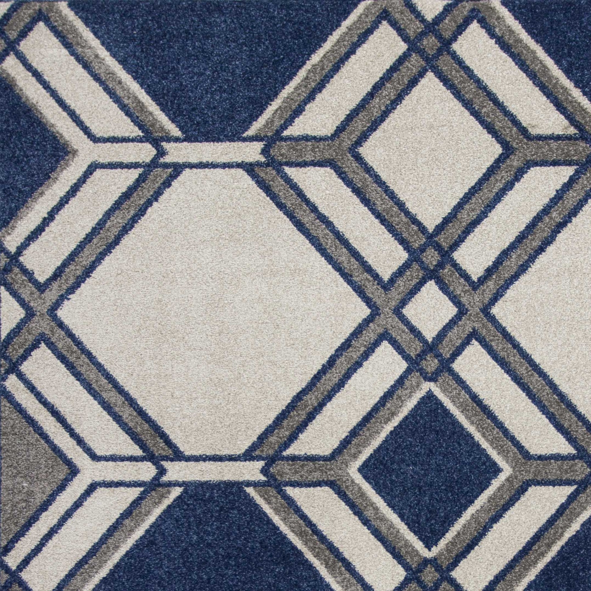 7x11 inches ivory and denim geometric hexagon rug, showcasing a modern design suitable for indoor use.