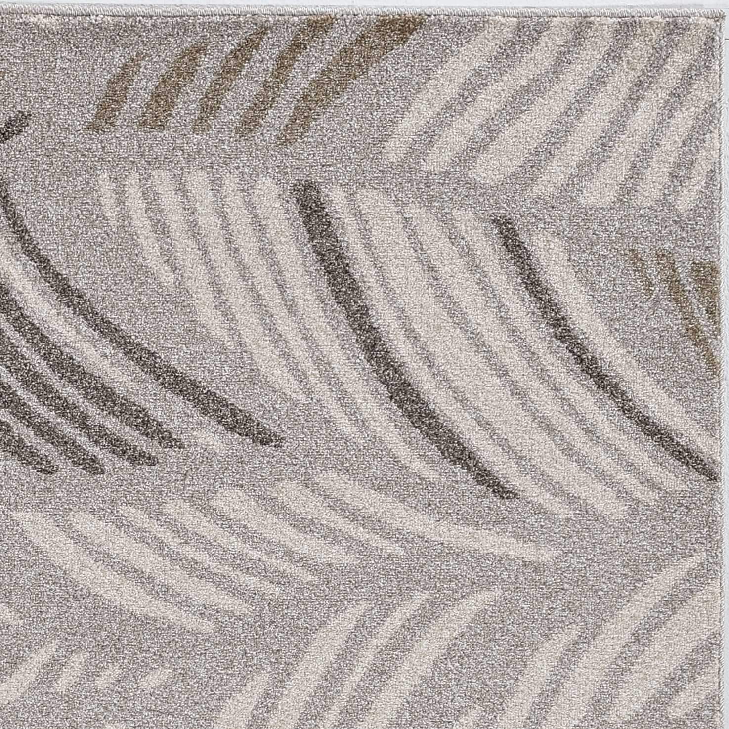 7x9 grey feather pattern area rug suitable for indoor and outdoor use, showcasing elegant design and durable material.