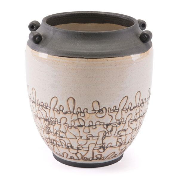 A stylish 8.3-inch white ceramic vase with a unique scribble-like texture and metallic glaze finish, perfect for home decor.