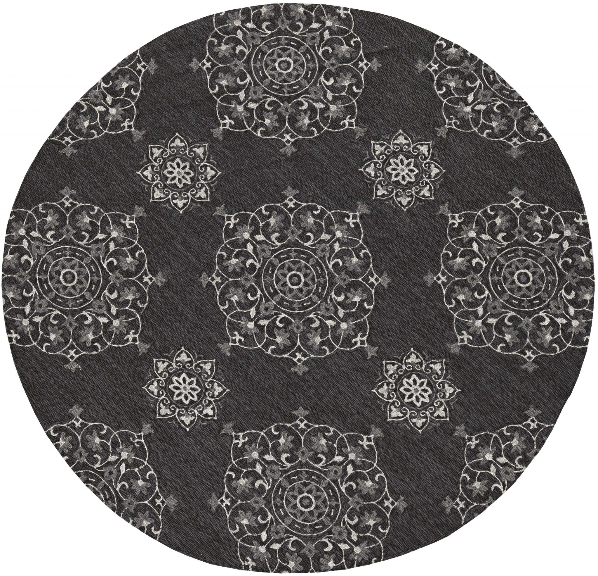 8-inch Charcoal Grey Hand Woven UV Treated Geometric Traditional rug displayed on a wooden floor, showcasing its intricate design and texture.