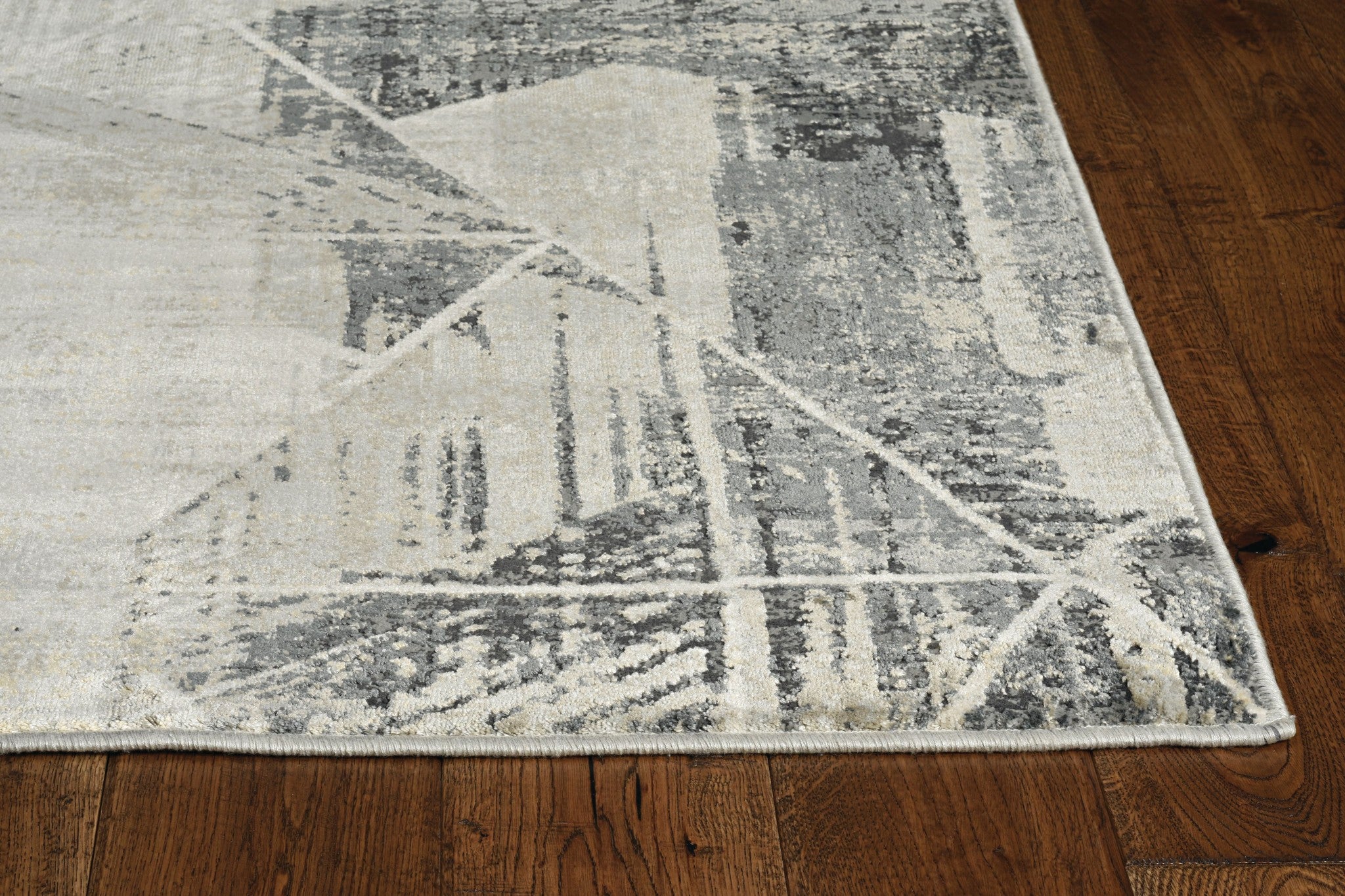 8-inch grey machine woven abstract geometric indoor runner rug with metallic accents, showcasing a contemporary design.