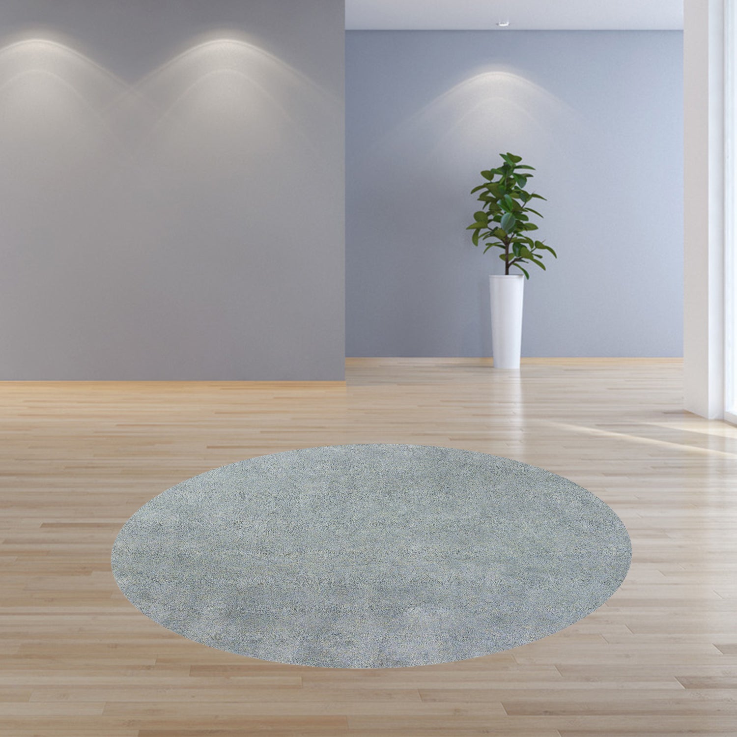 8-inch round polyester blue heather area rug with a soft texture and contemporary design, perfect for enhancing home decor.