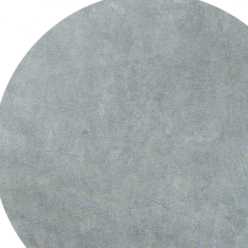 8-inch round polyester blue heather area rug with a soft texture and contemporary design, perfect for enhancing home decor.