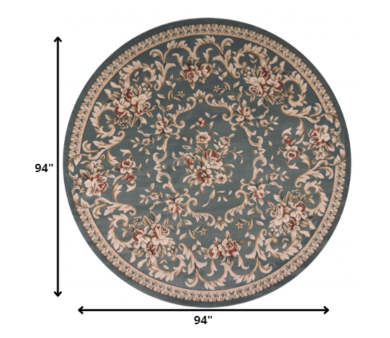 8-inch round slate blue floral vine bordered indoor area rug, showcasing intricate floral patterns and a modern design.