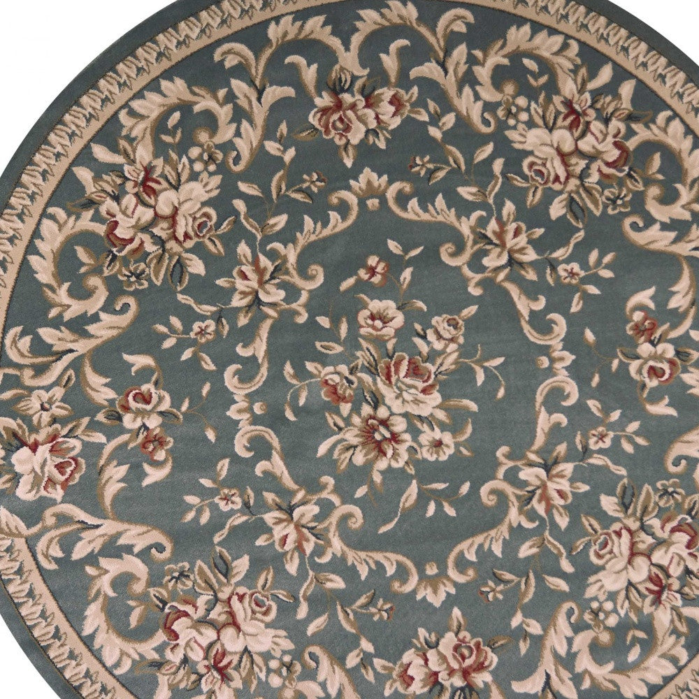 8-inch round slate blue floral vine bordered indoor area rug, showcasing intricate floral patterns and a modern design.