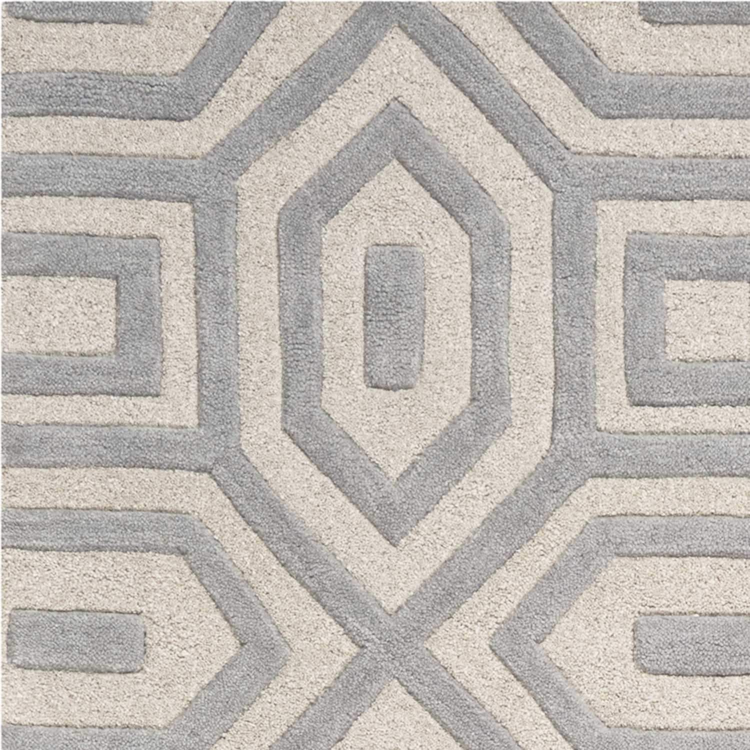 A luxurious 8x10 wool grey area rug, hand-tufted with multi-textured wool, showcasing a modern design suitable for any living space.