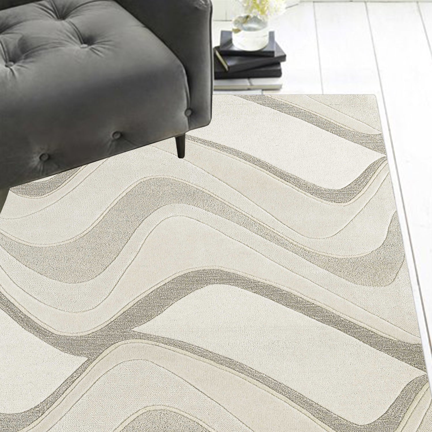 A luxurious 8x10 inches ivory wool area rug featuring elegant wave patterns, perfect for contemporary home decor.