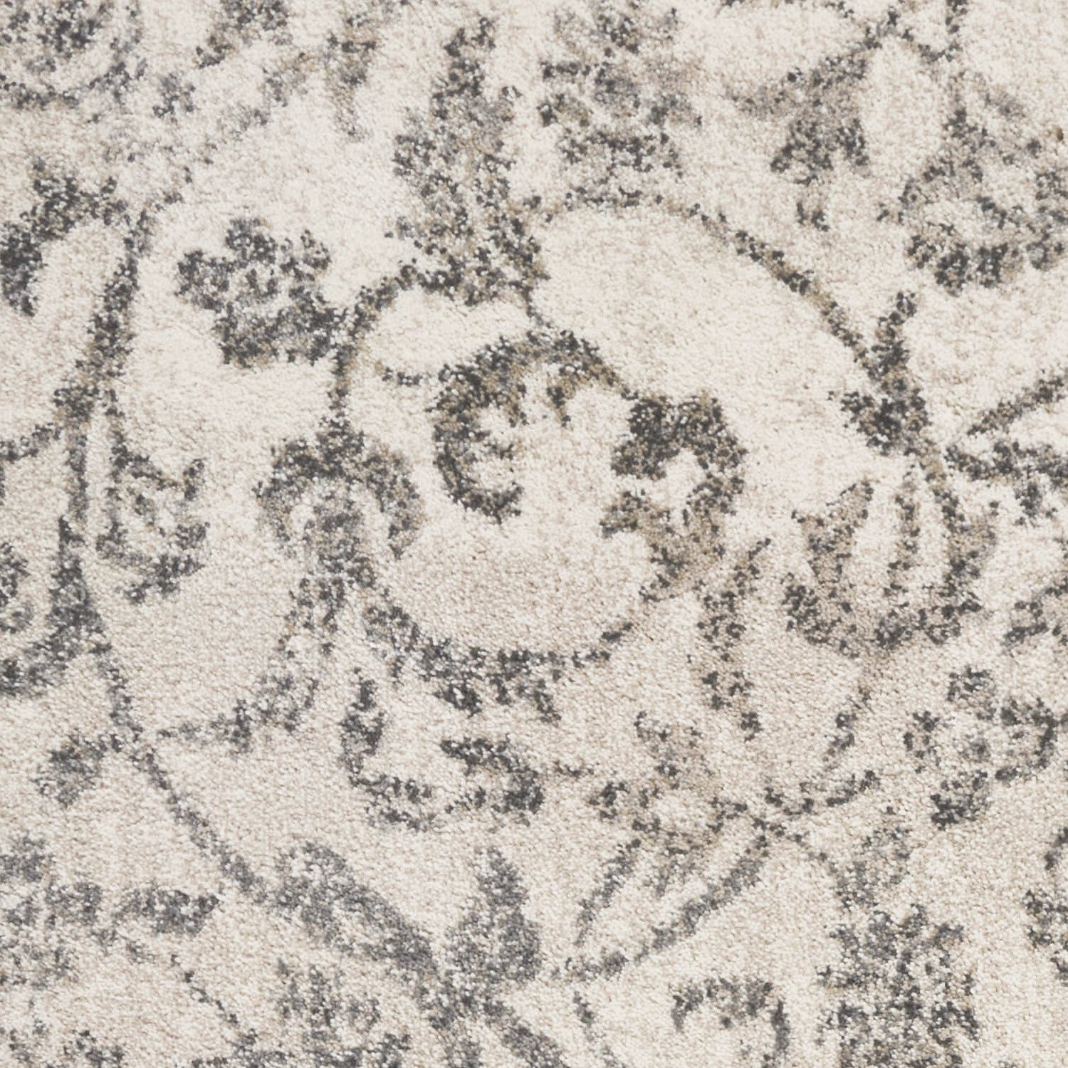 8x10 inches ivory machine woven rug featuring distressed floral vines design, perfect for indoor spaces.