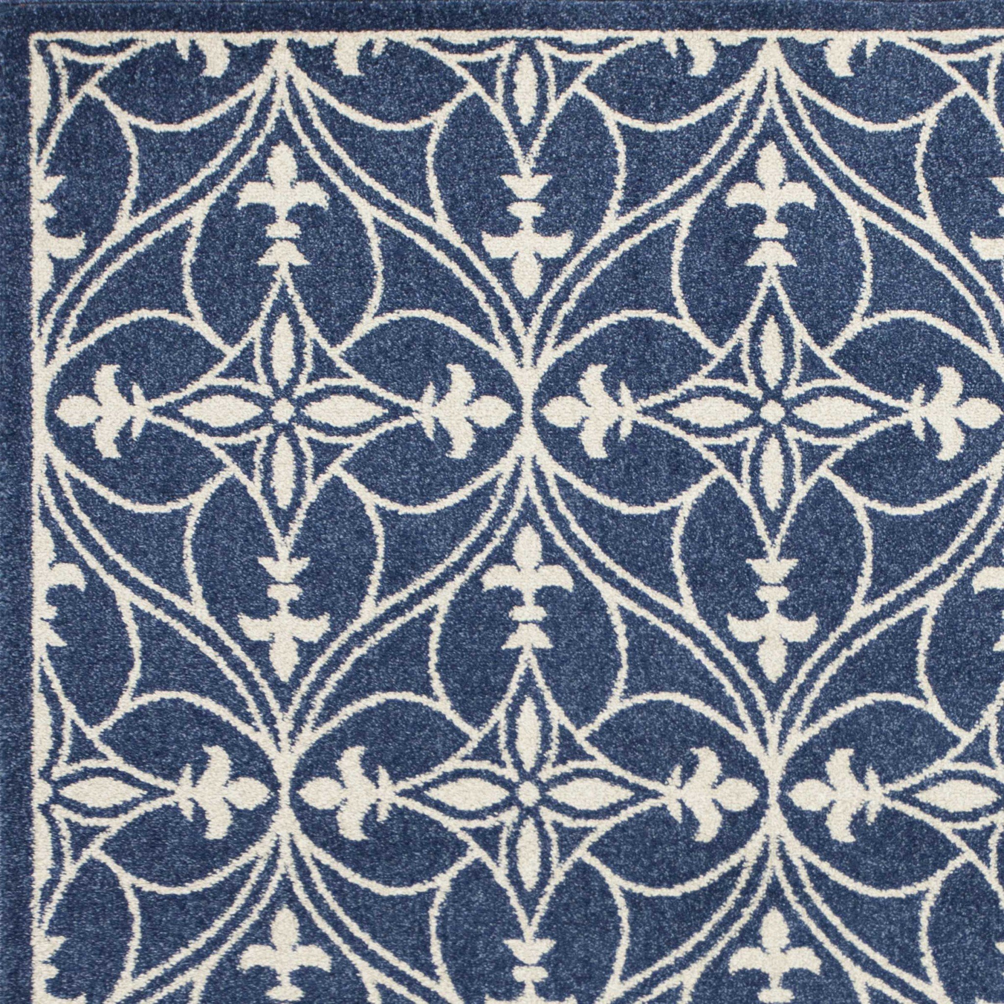 Denim blue machine woven ogee indoor rug showcasing intricate patterns and high-quality craftsmanship, perfect for modern home decor.