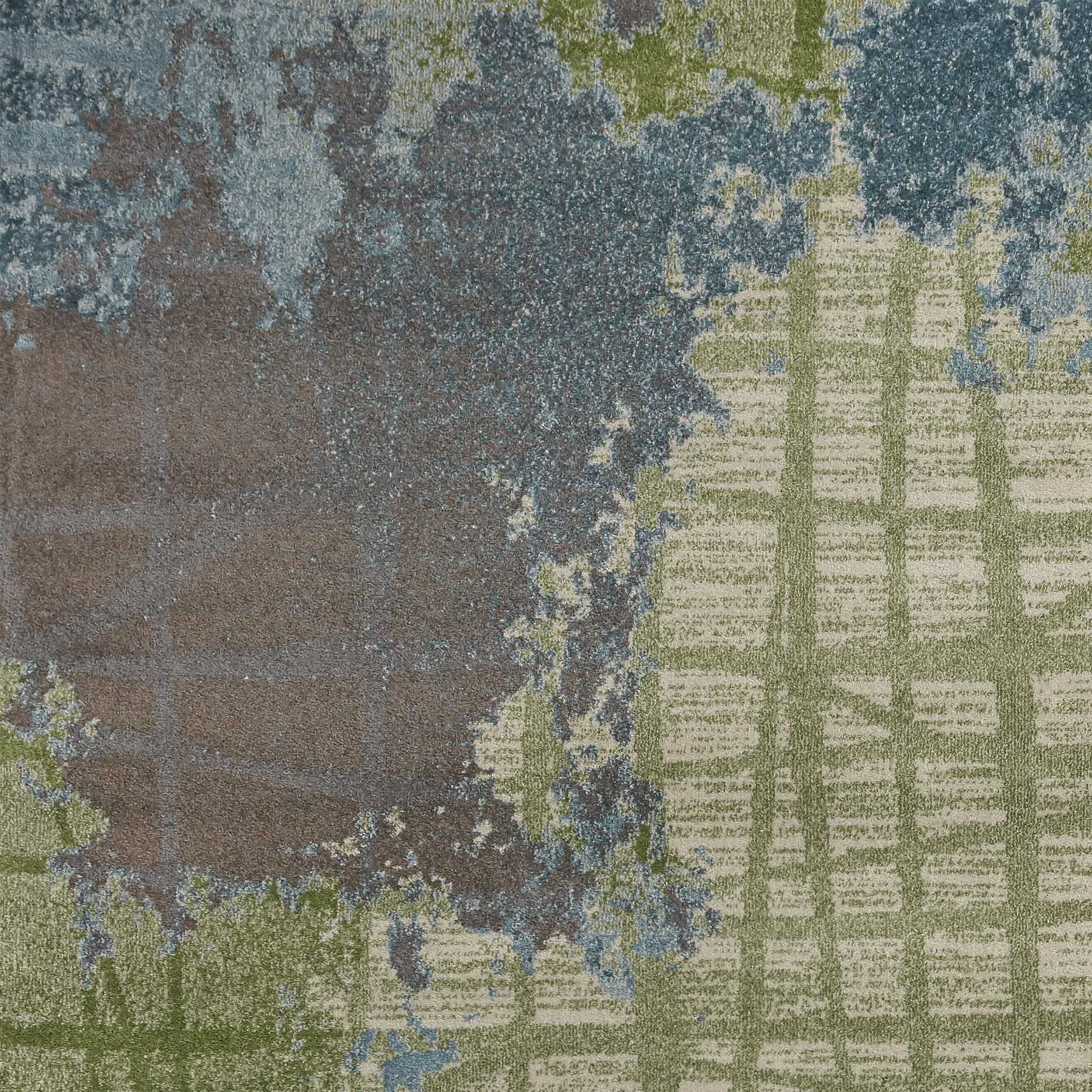 A vibrant green and blue abstract indoor area rug, machine woven, showcasing watercolor designs, perfect for contemporary home decor.