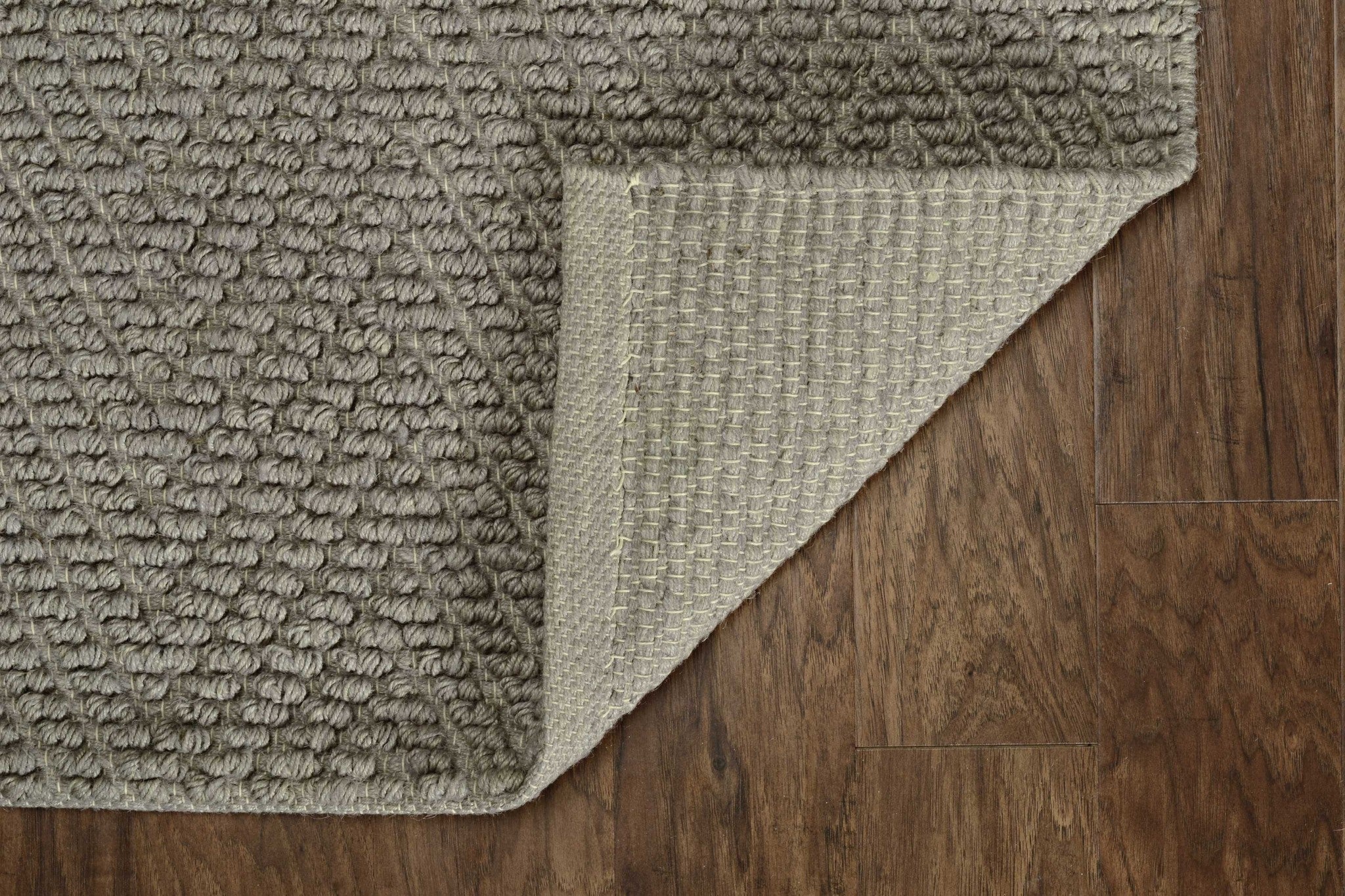 8x11 inches Grey Heather Hand Woven Herringbone Jute Indoor Area Rug showcasing a stylish herringbone pattern in natural jute fibers.