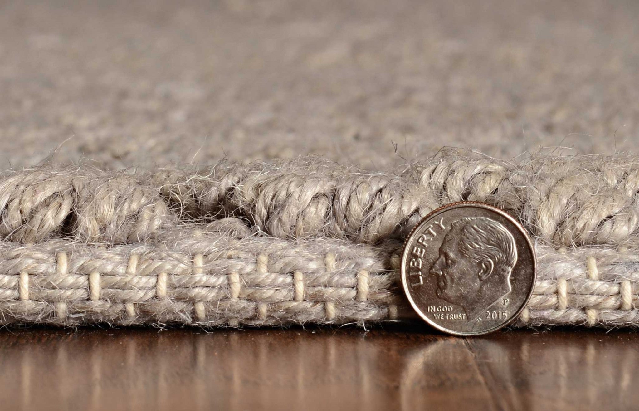 8x11 inches Grey Heather Hand Woven Herringbone Jute Indoor Area Rug showcasing a stylish herringbone pattern in natural jute fibers.