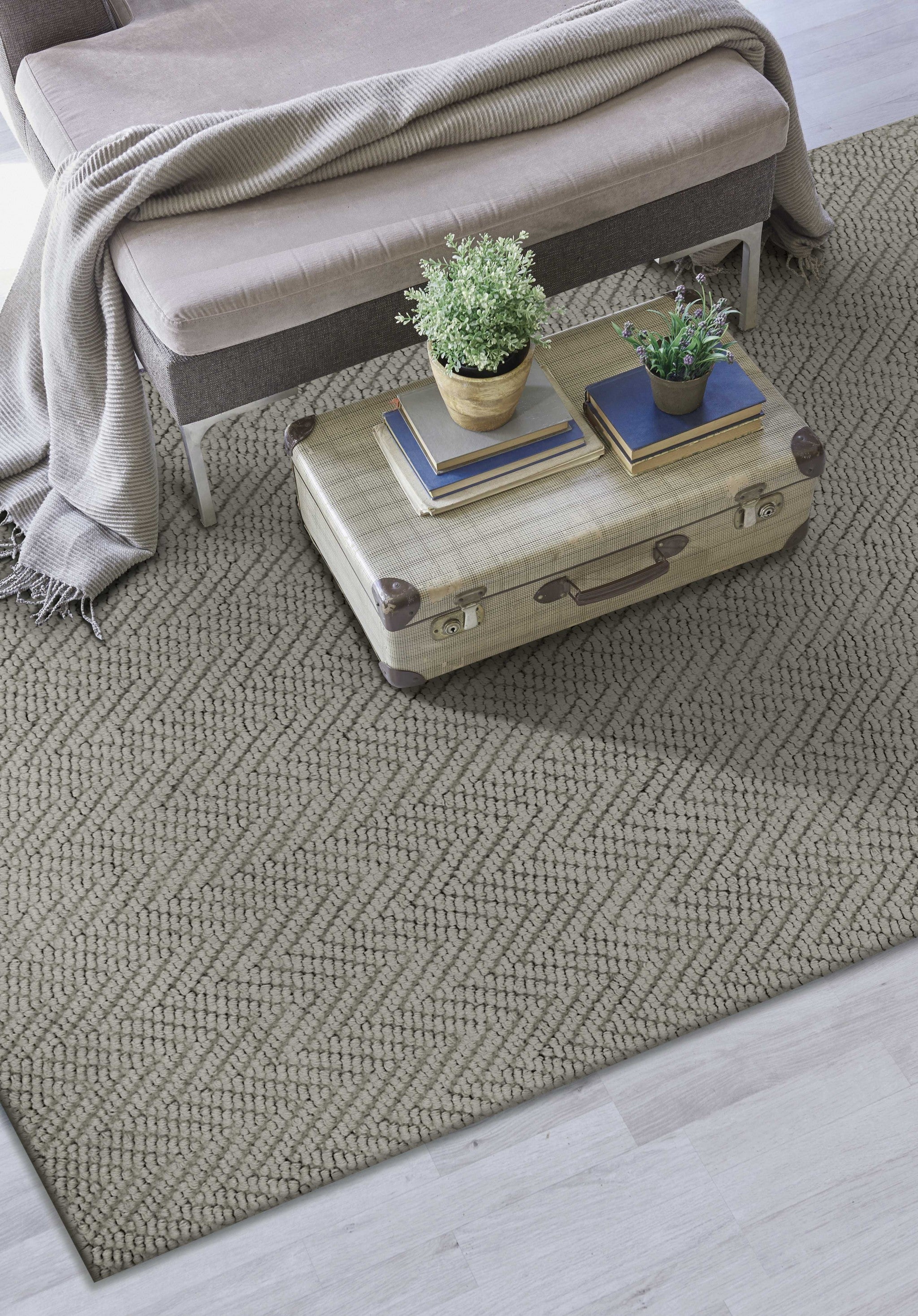 8x11 inches Grey Heather Hand Woven Herringbone Jute Indoor Area Rug showcasing a stylish herringbone pattern in natural jute fibers.