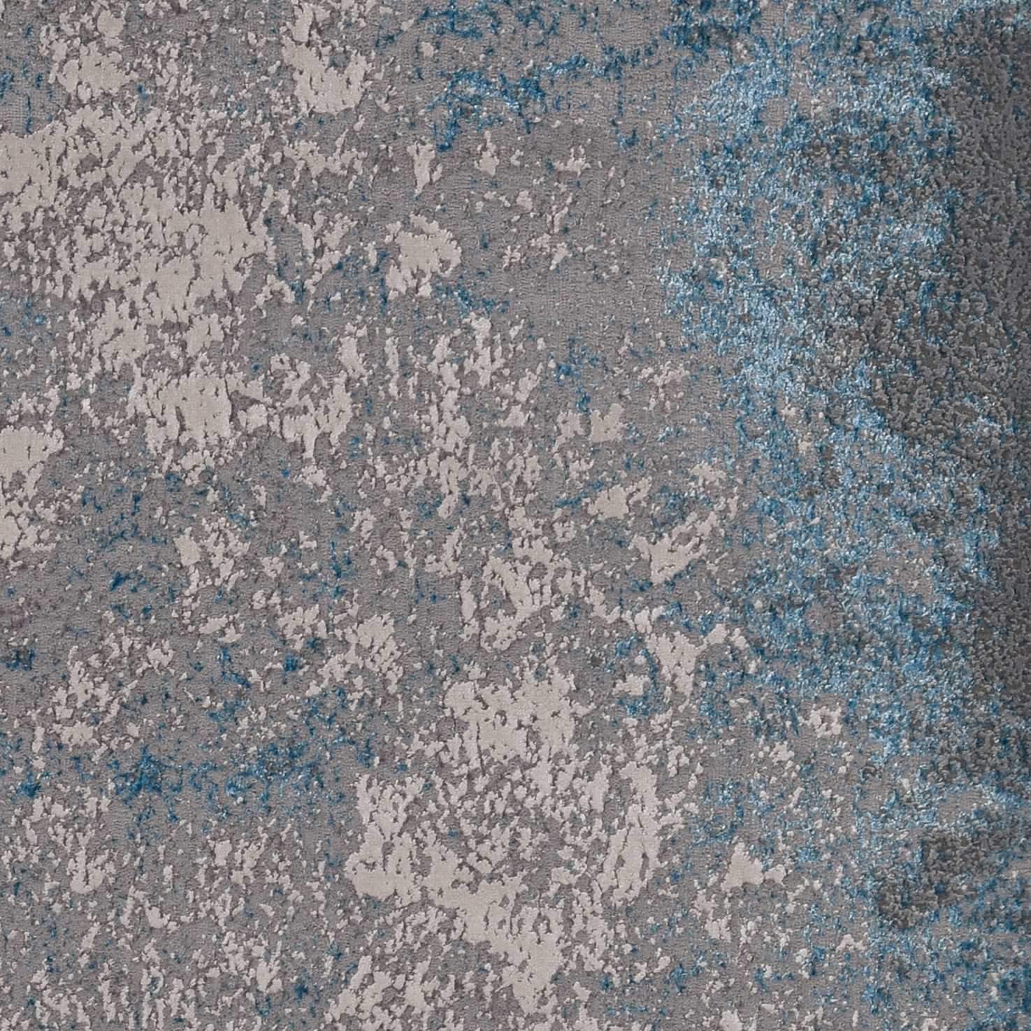 8x11 inches silver blue machine woven abstract smudge indoor area rug with soft texture and metallic highlights.