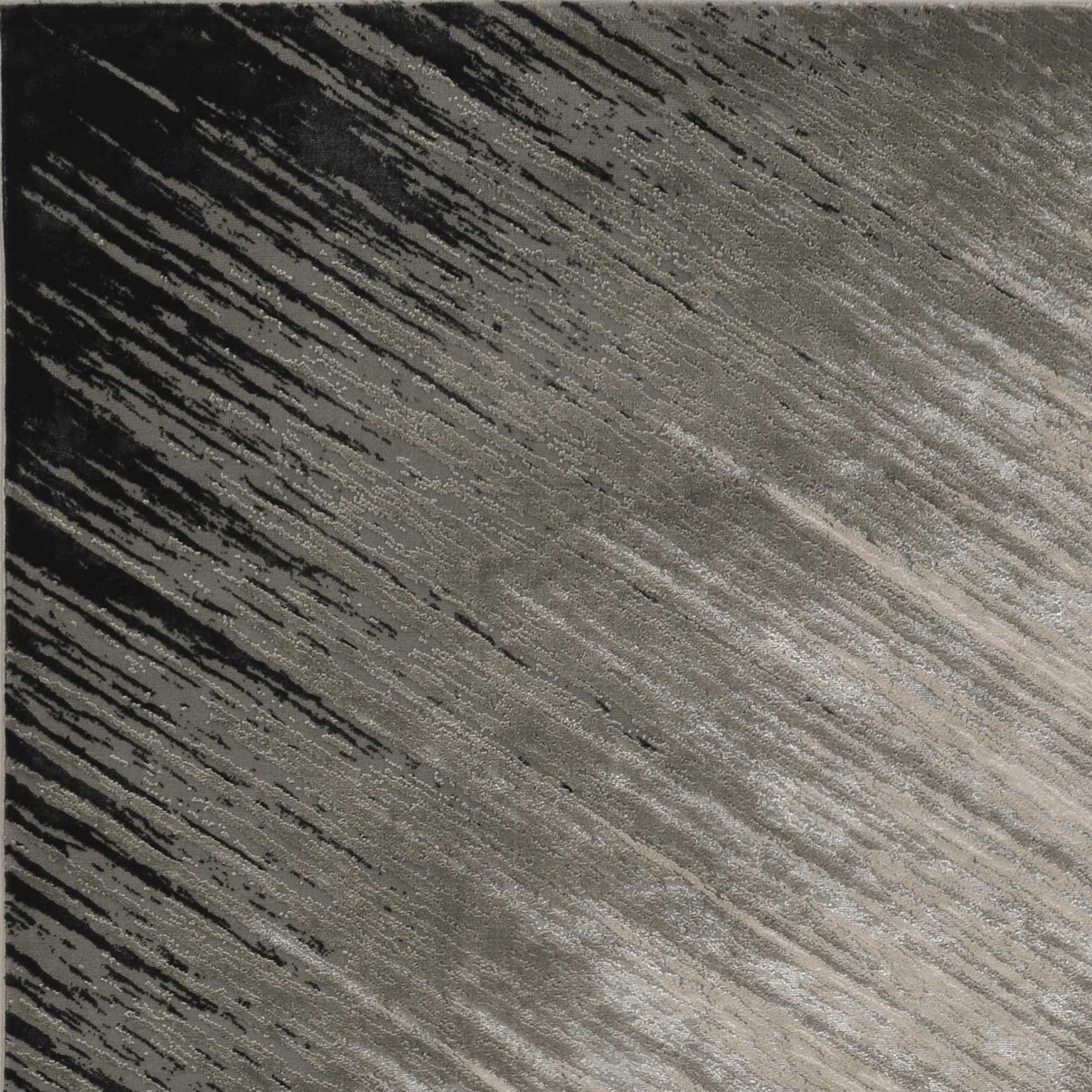 A stylish silver grey machine woven abstract brushstroke indoor rug, showcasing modern design and intricate patterns, perfect for enhancing home decor.