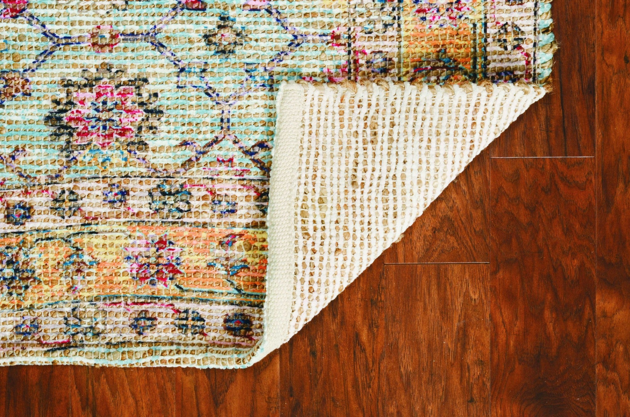 90 x 114 Spa Jute or Polyester Rug featuring vibrant colors and traditional prints, hand-woven in India.