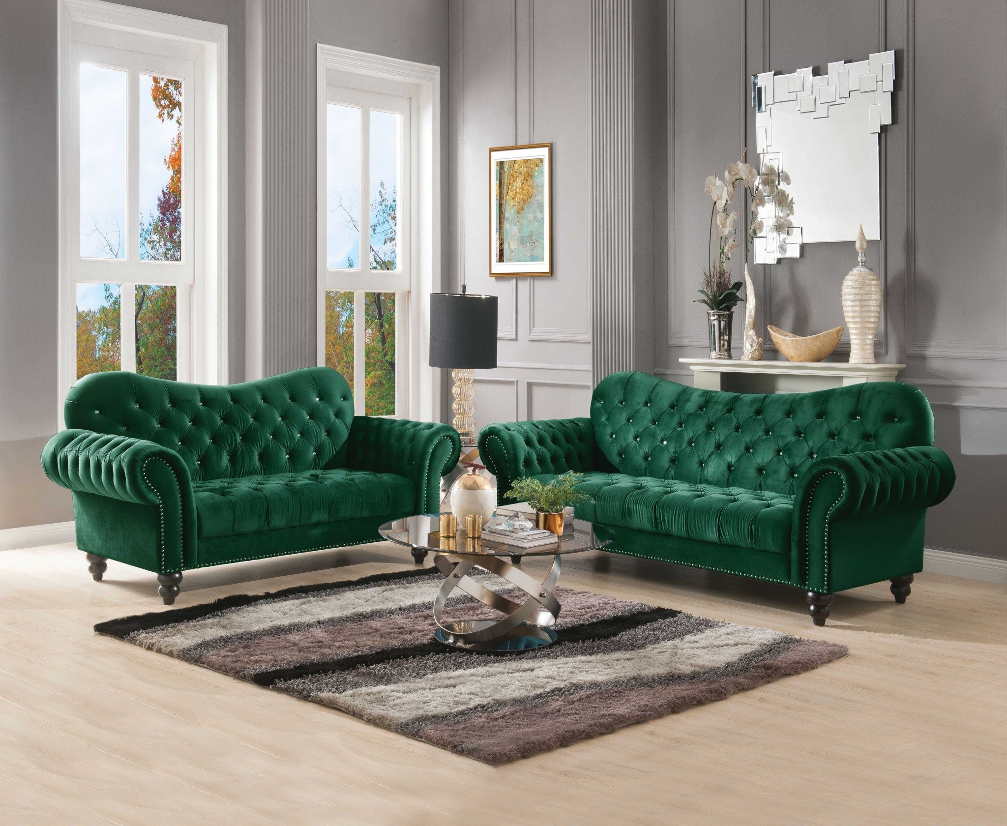 A luxurious green velvet sofa measuring 91x37x39 inches, featuring button tufting and chrome finish metal legs, perfect for stylish living rooms.