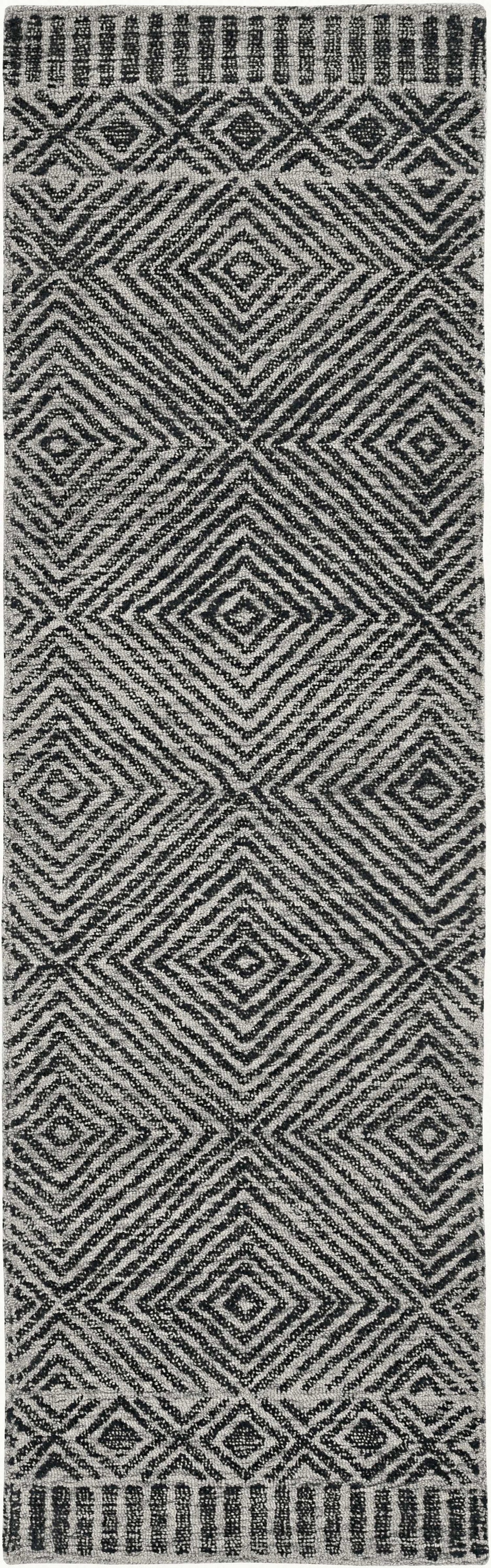 A luxurious 96 x 132 grey and black wool rug, hand-tufted with intricate patterns, perfect for enhancing living room decor.