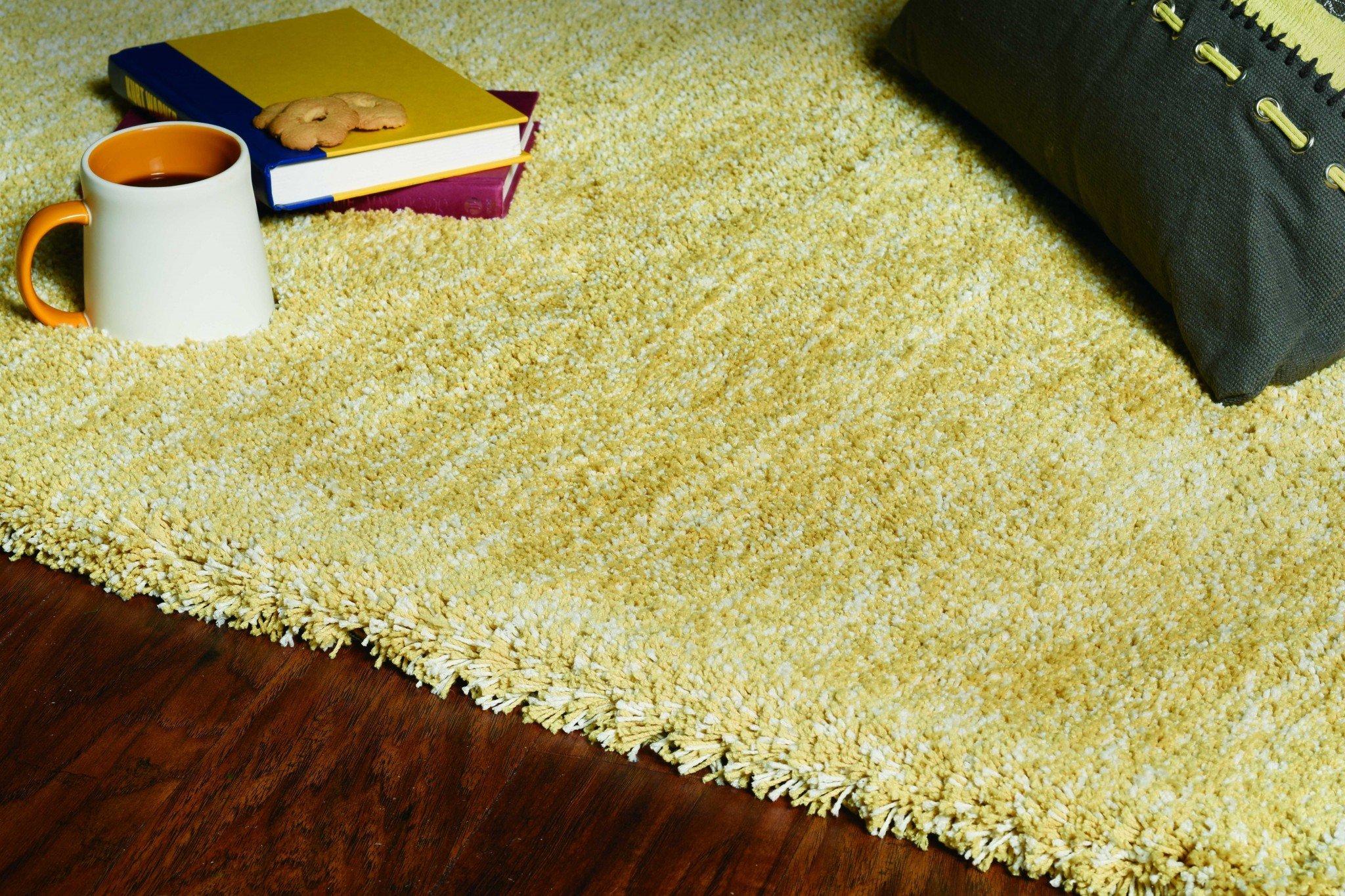 A vibrant yellow heather indoor shag rug measuring 9x13 feet, showcasing a soft texture and modern design, perfect for enhancing home decor.