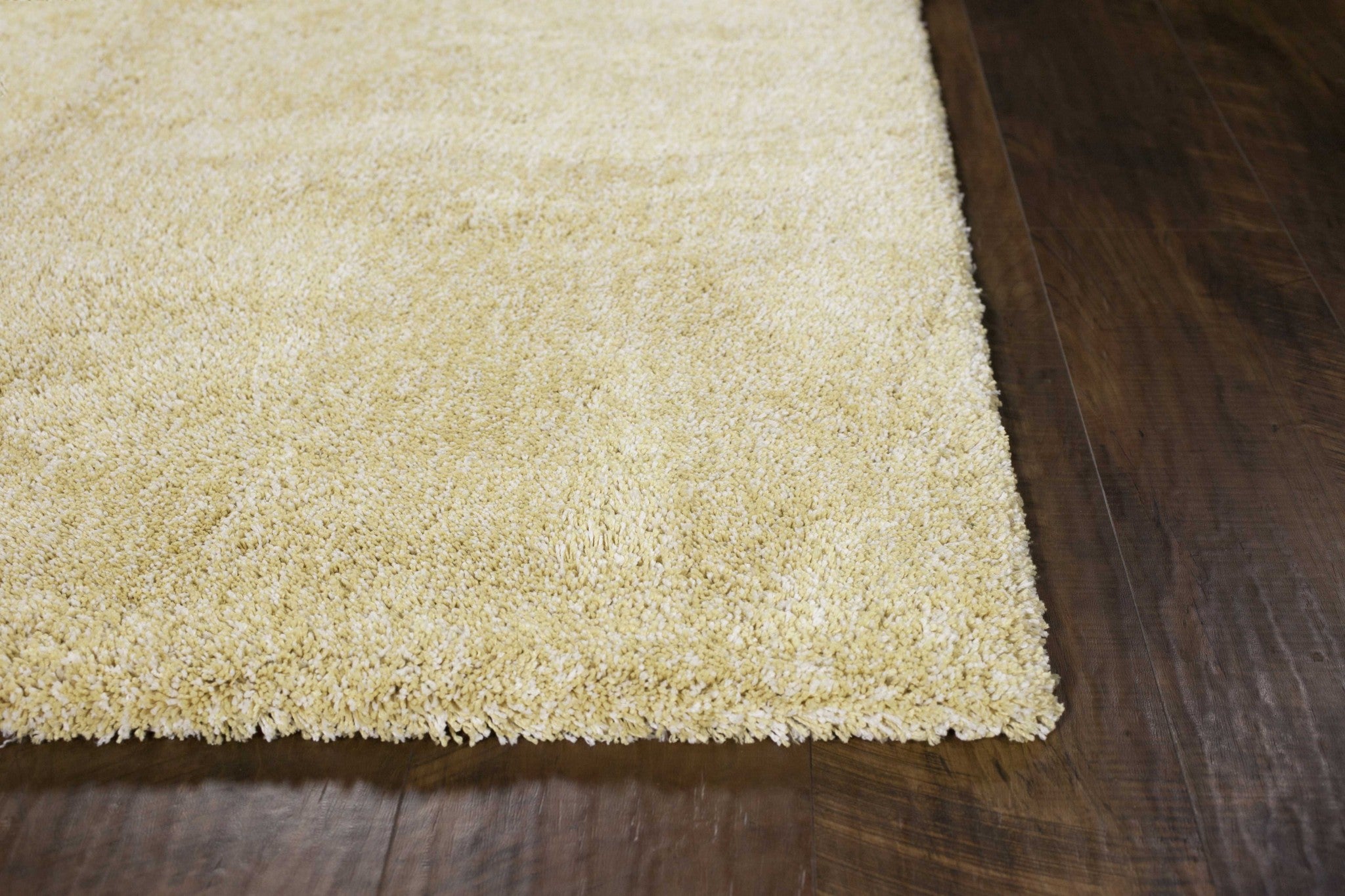 A vibrant yellow heather indoor shag rug measuring 9x13 feet, showcasing a soft texture and modern design, perfect for enhancing home decor.