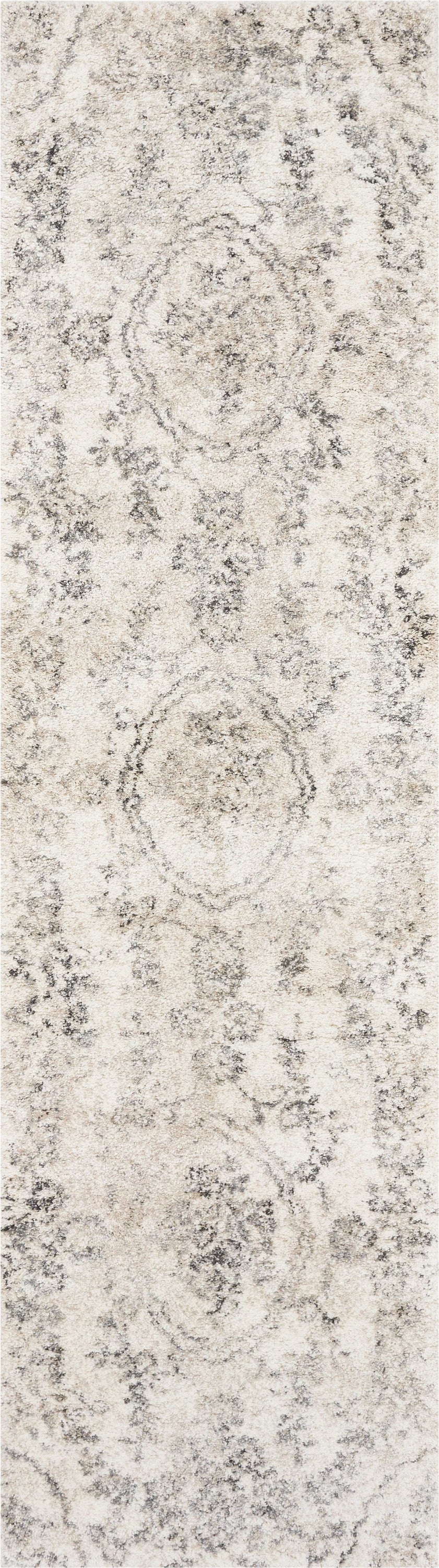 A beautiful 9x13 inches grey machine woven distressed floral traditional rug, showcasing intricate floral patterns and a soft texture, perfect for home decor.