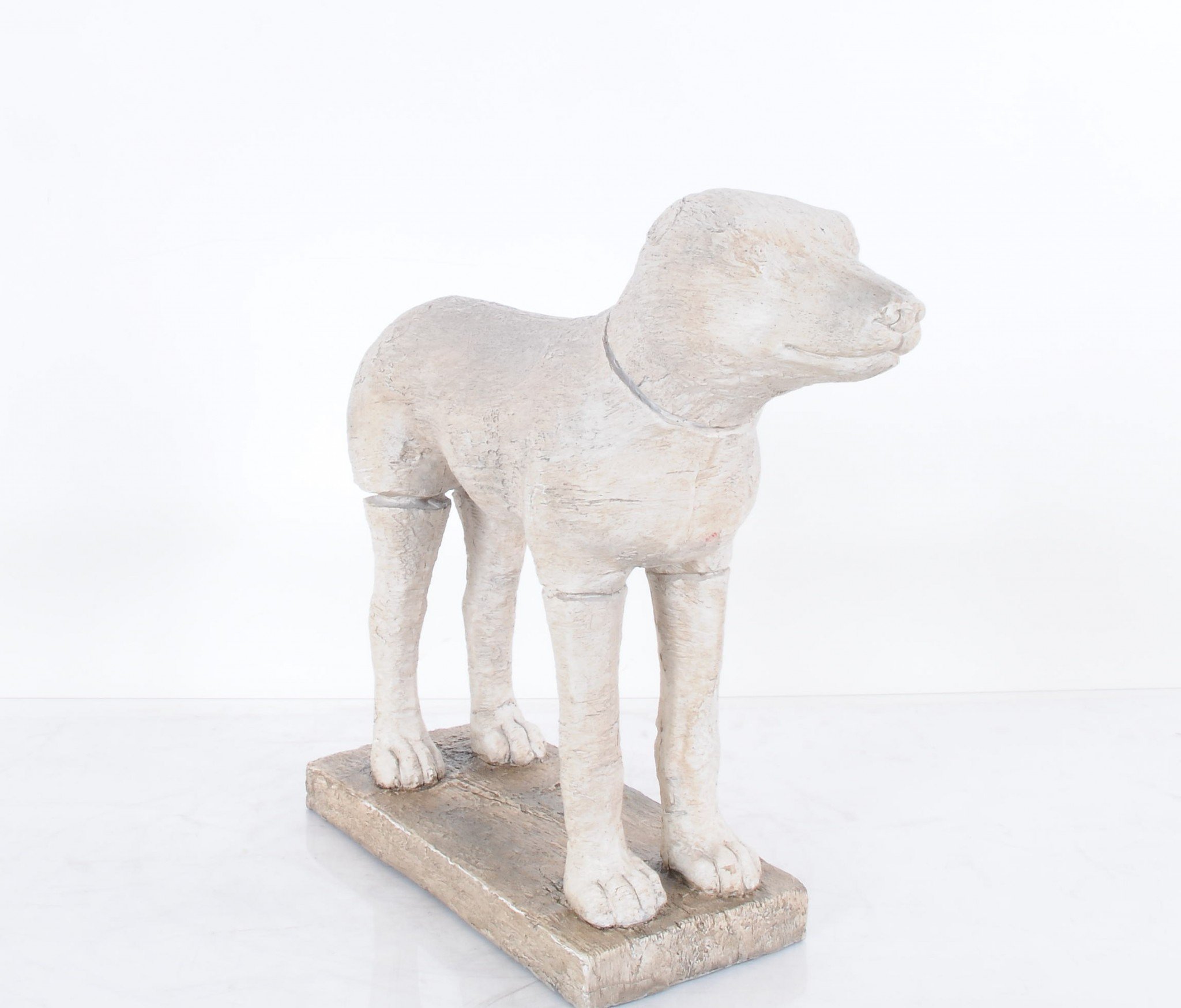 A charming handmade resin statue of an adorable dog, measuring 17 inches long, perfect for dog lovers' home decor.