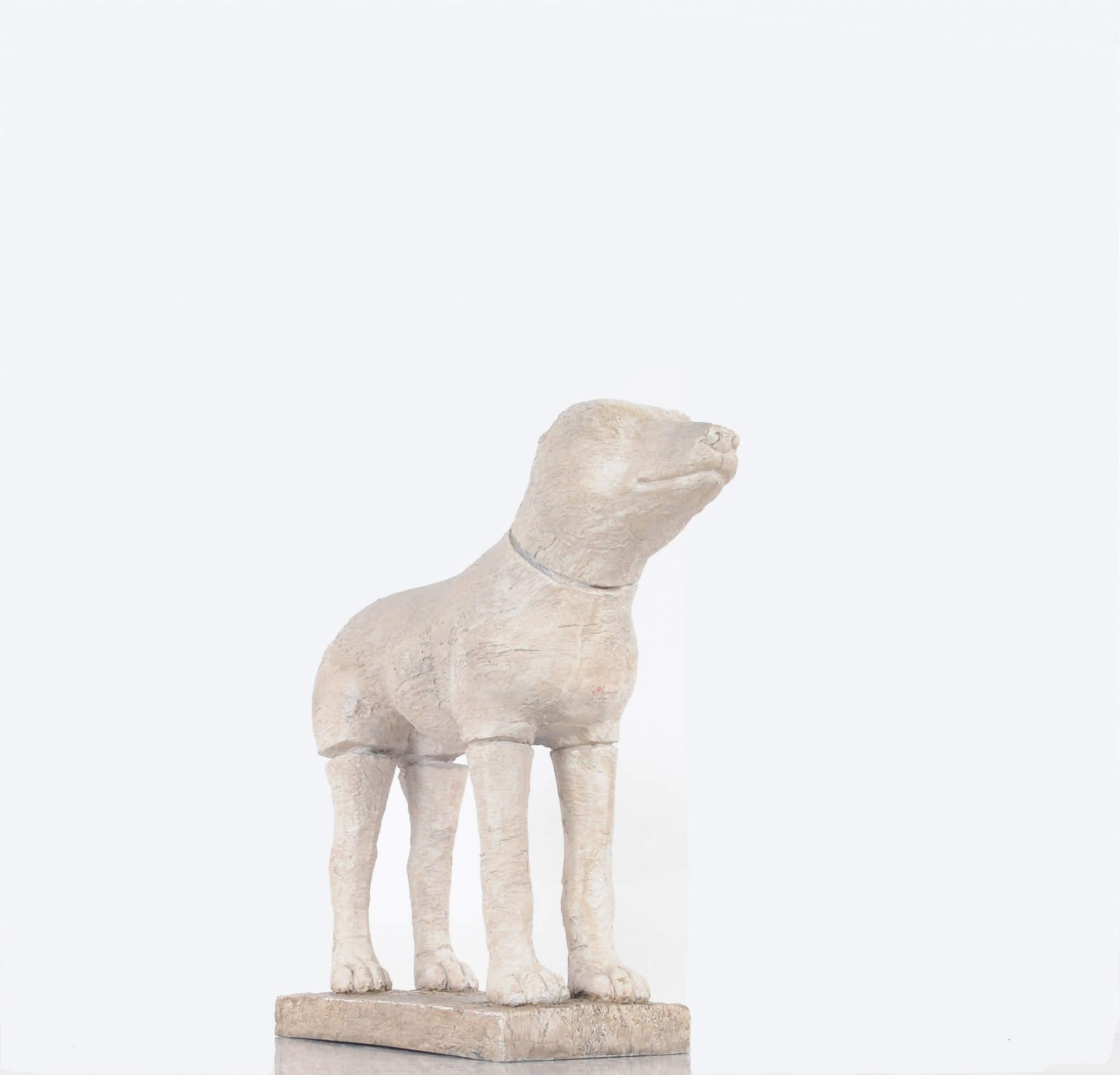 A charming handmade resin statue of an adorable dog, measuring 17 inches long, perfect for dog lovers' home decor.