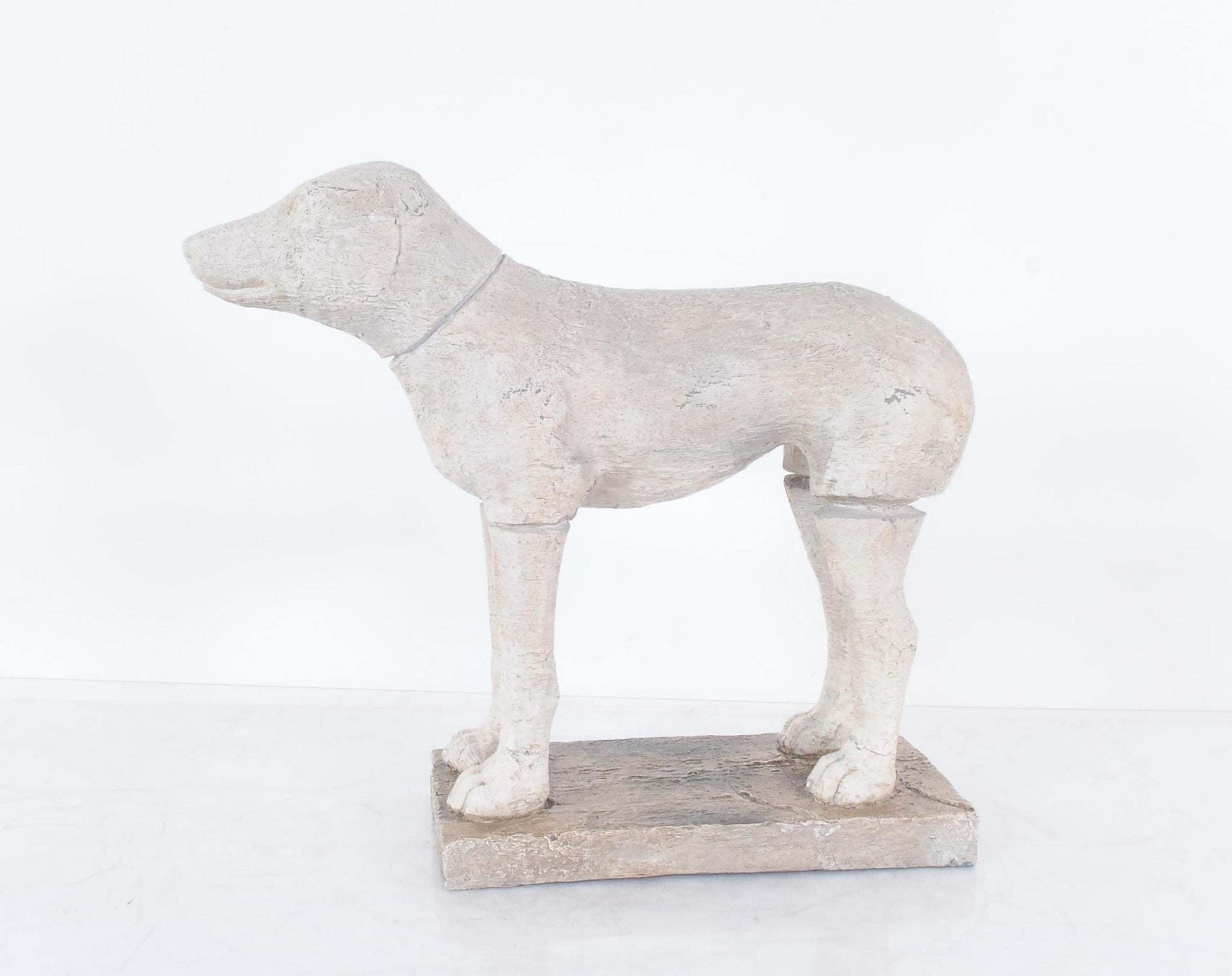 A charming handmade resin statue of an adorable dog, measuring 17 inches long, perfect for dog lovers' home decor.