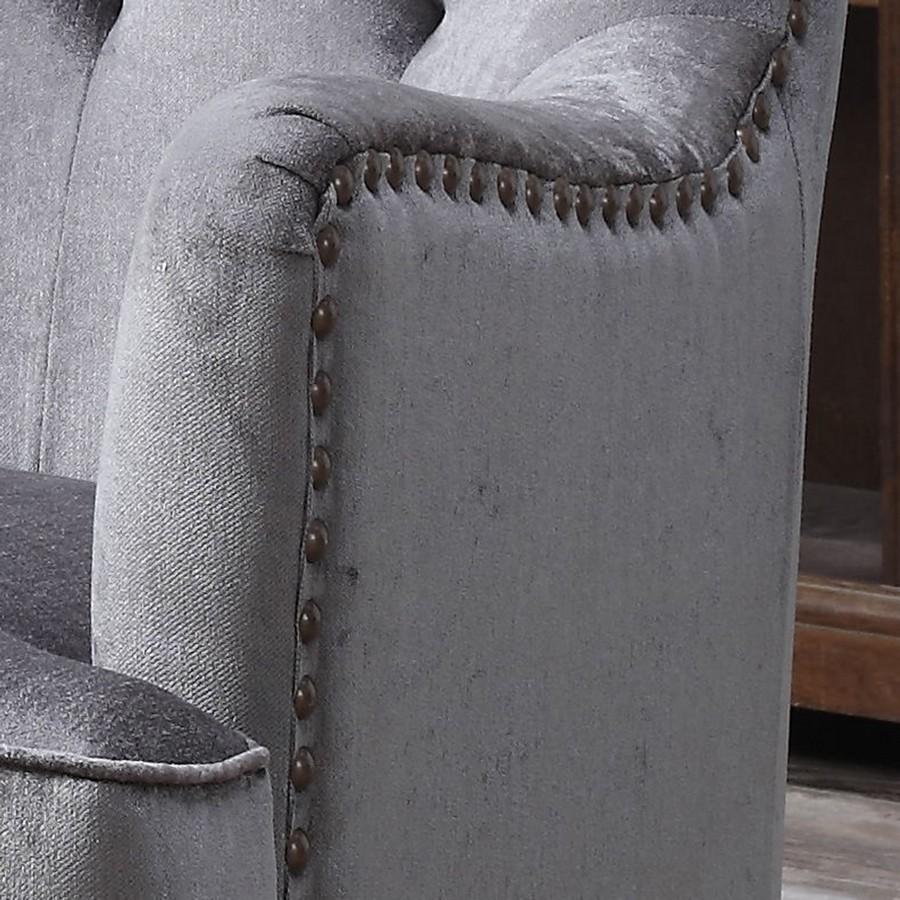 Anthracite Contemporary Tufted Hardwood Wingback Accent Chair with button tufting and nail head trim, showcasing a sleek gray upholstery and sturdy wooden legs.