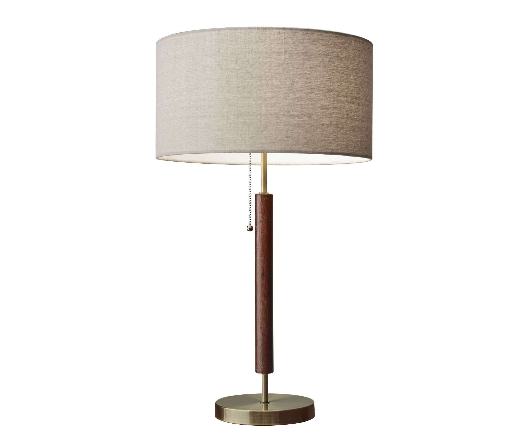 Antique brass metal and walnut wood table lamp with a natural linen shade and brass pull chain switch, perfect for mid-century modern decor.