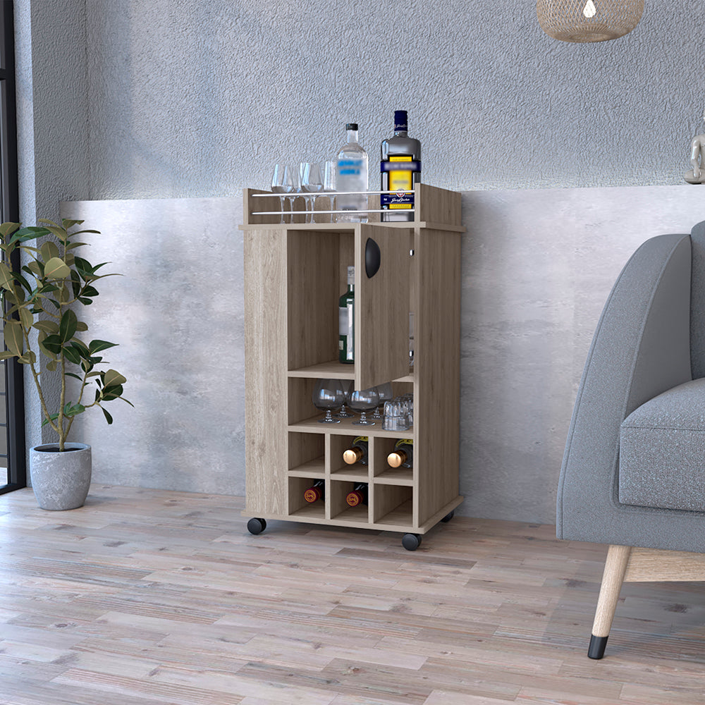 Light gray Reese Bar Cart with casters, featuring six wine cubbies and a single-door cabinet, perfect for home entertaining.