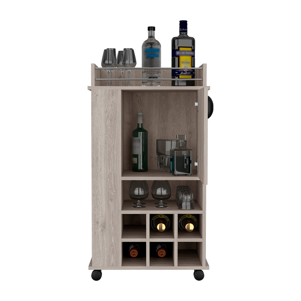 Light gray Reese Bar Cart with casters, featuring six wine cubbies and a single-door cabinet, perfect for home entertaining.