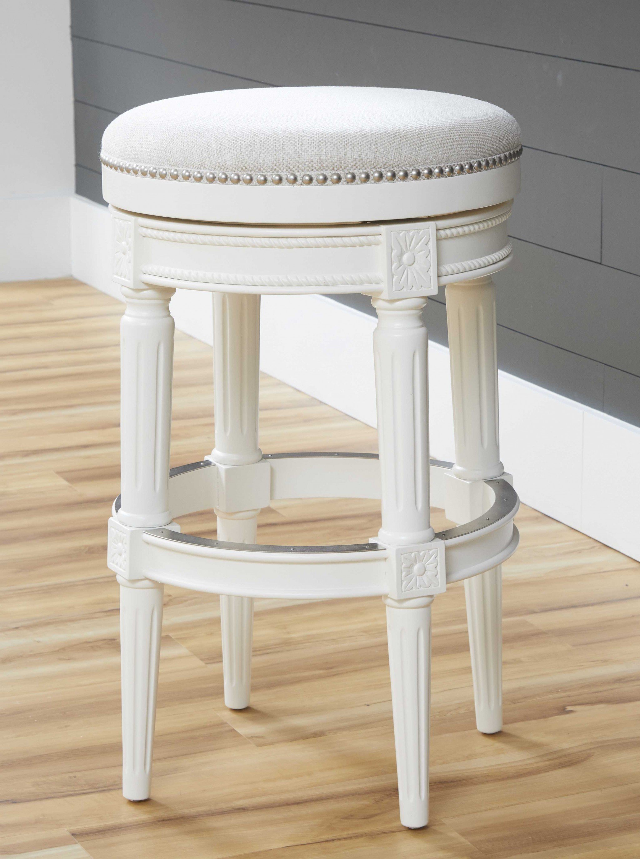 Bar Height Round Backless Stool in White Fabric, featuring a sleek design and full swivel seat, perfect for modern and rustic interiors.