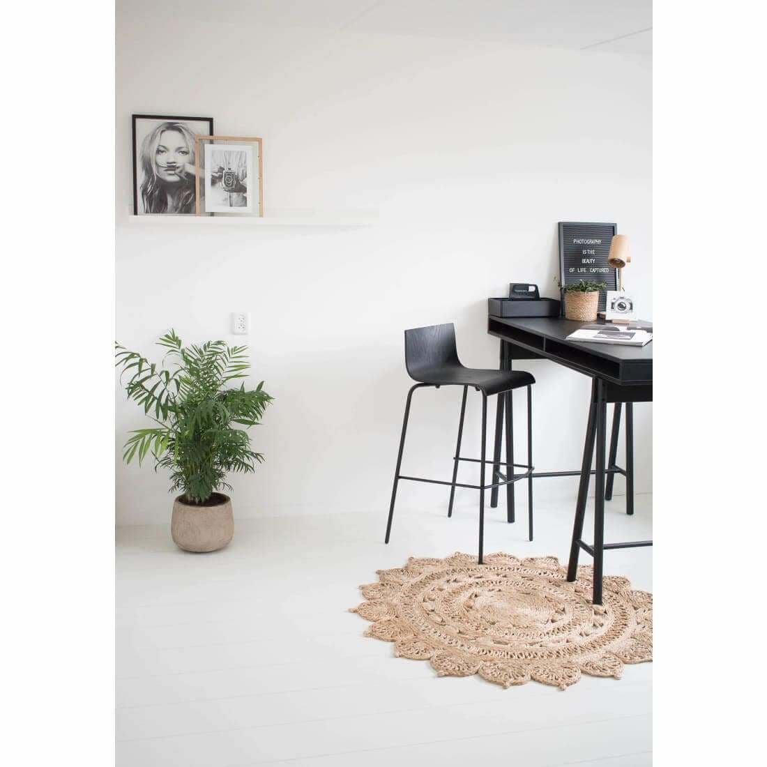 Barstool Pure Oak Black showcasing its elegant oak wood design and comfortable footrest, perfect for kitchen or bar use.