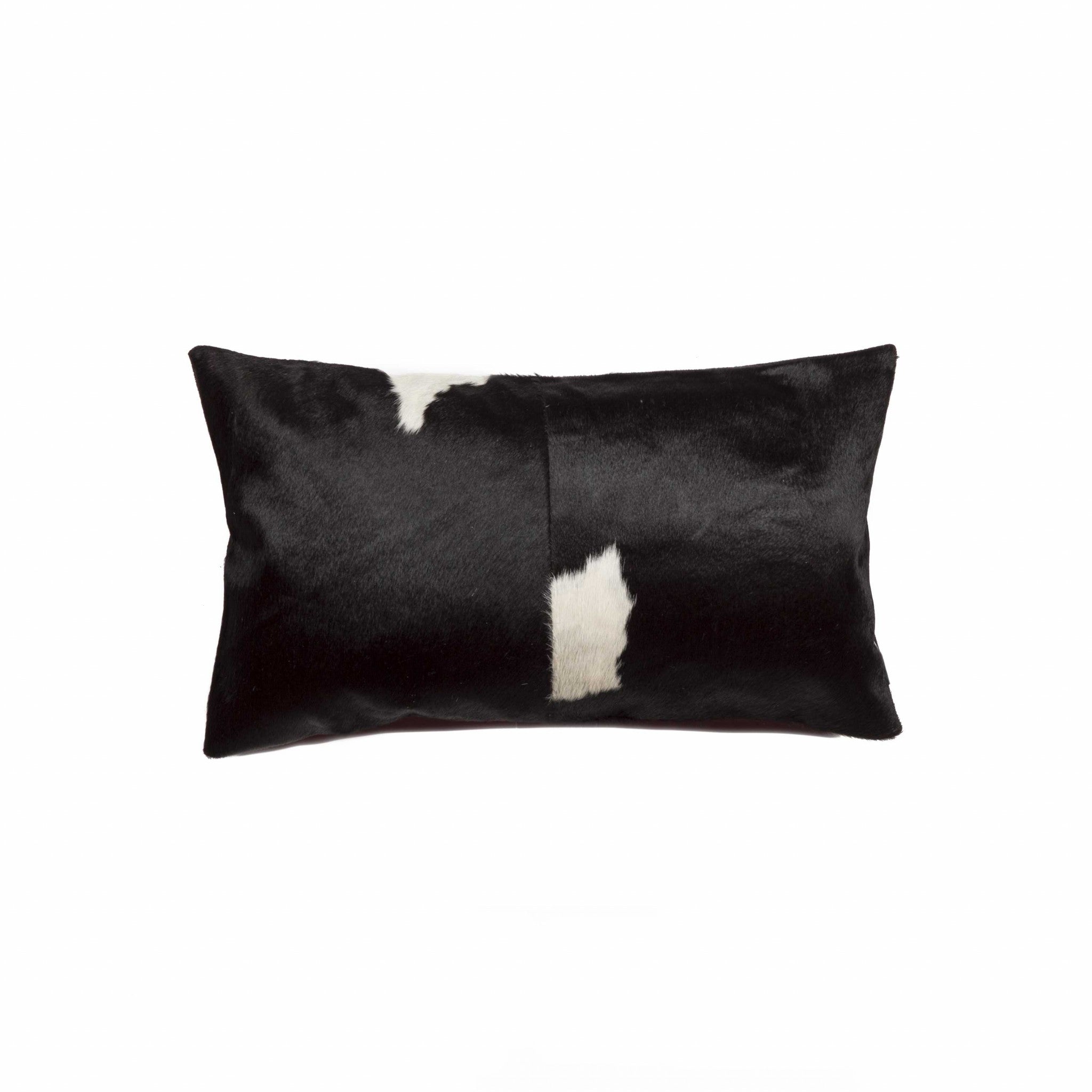 Black and White Torino Kobe Cowhide Pillow showcasing unique mottling and luxurious texture, perfect for modern decor.