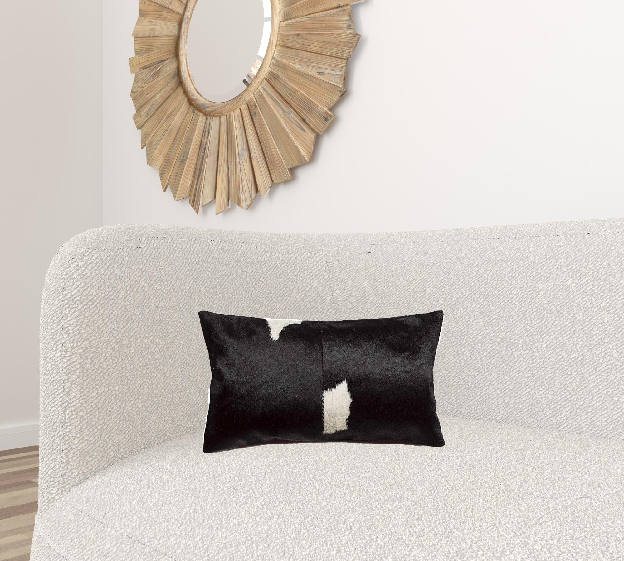 Black and White Torino Kobe Cowhide Pillow showcasing unique mottling and luxurious texture, perfect for modern decor.