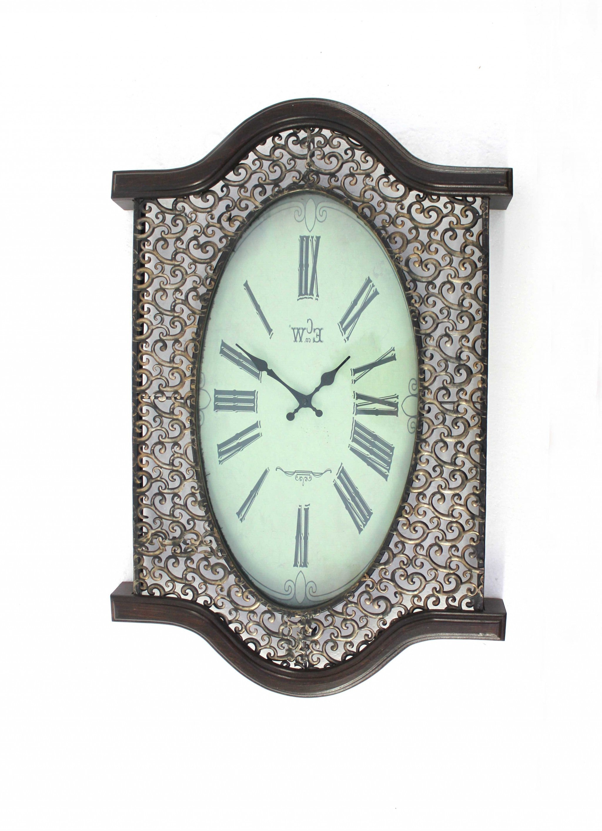 Bronze Finish Wooden Vintage Wall Clock with Roman numerals and scrolling metalwork design, showcasing elegant hour and minute hands.