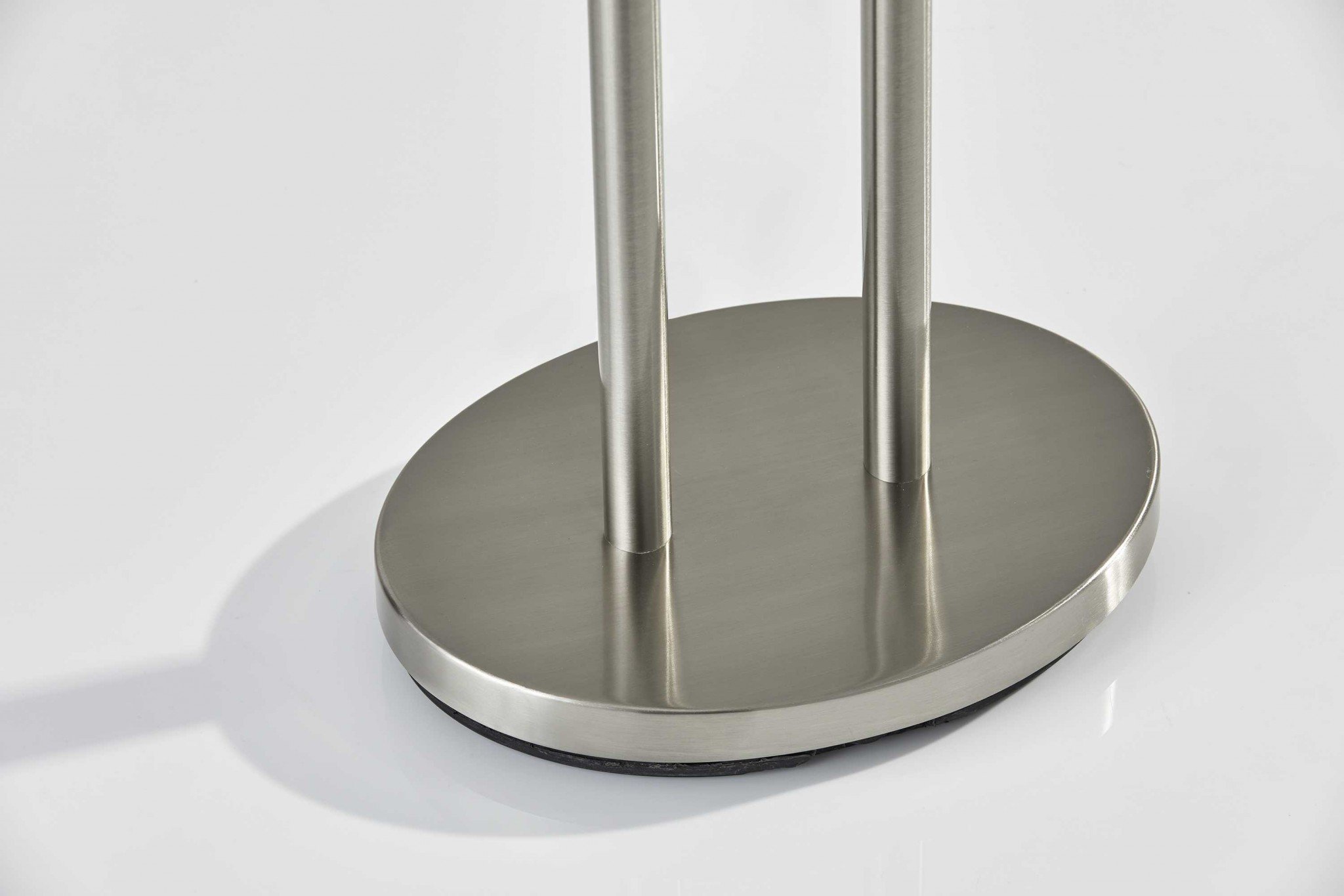 Brushed Steel Dual Pole Metal Table Lamp with off-white oval shade, showcasing modern design and dual pull chain switches.