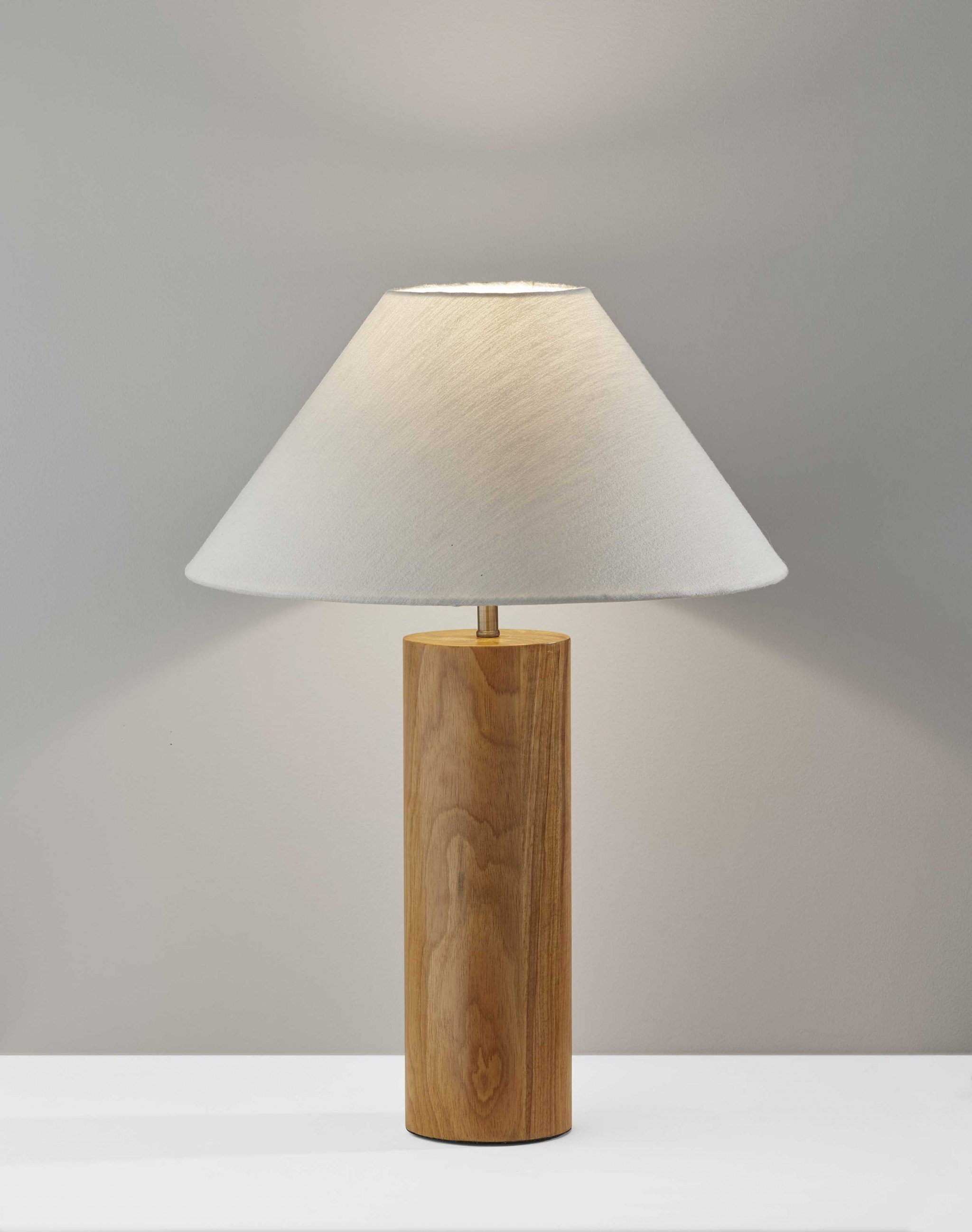 Canopy Natural Wood Block Table Lamp featuring a circular oak wood base and white textured fabric shade with antique brass accents.