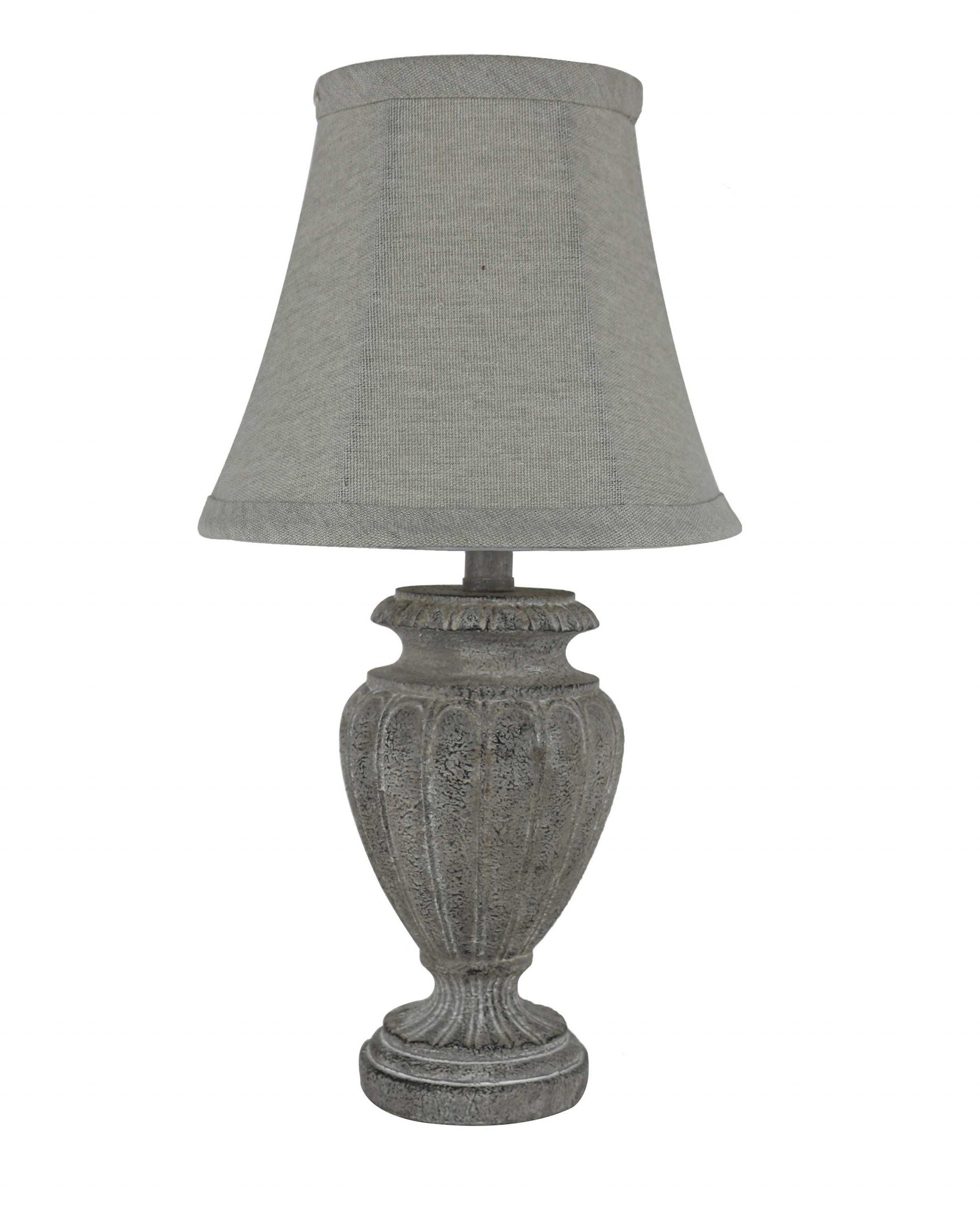 Concrete Urn Accent Lamp showcasing elegant design and warm lighting, perfect for home decor.