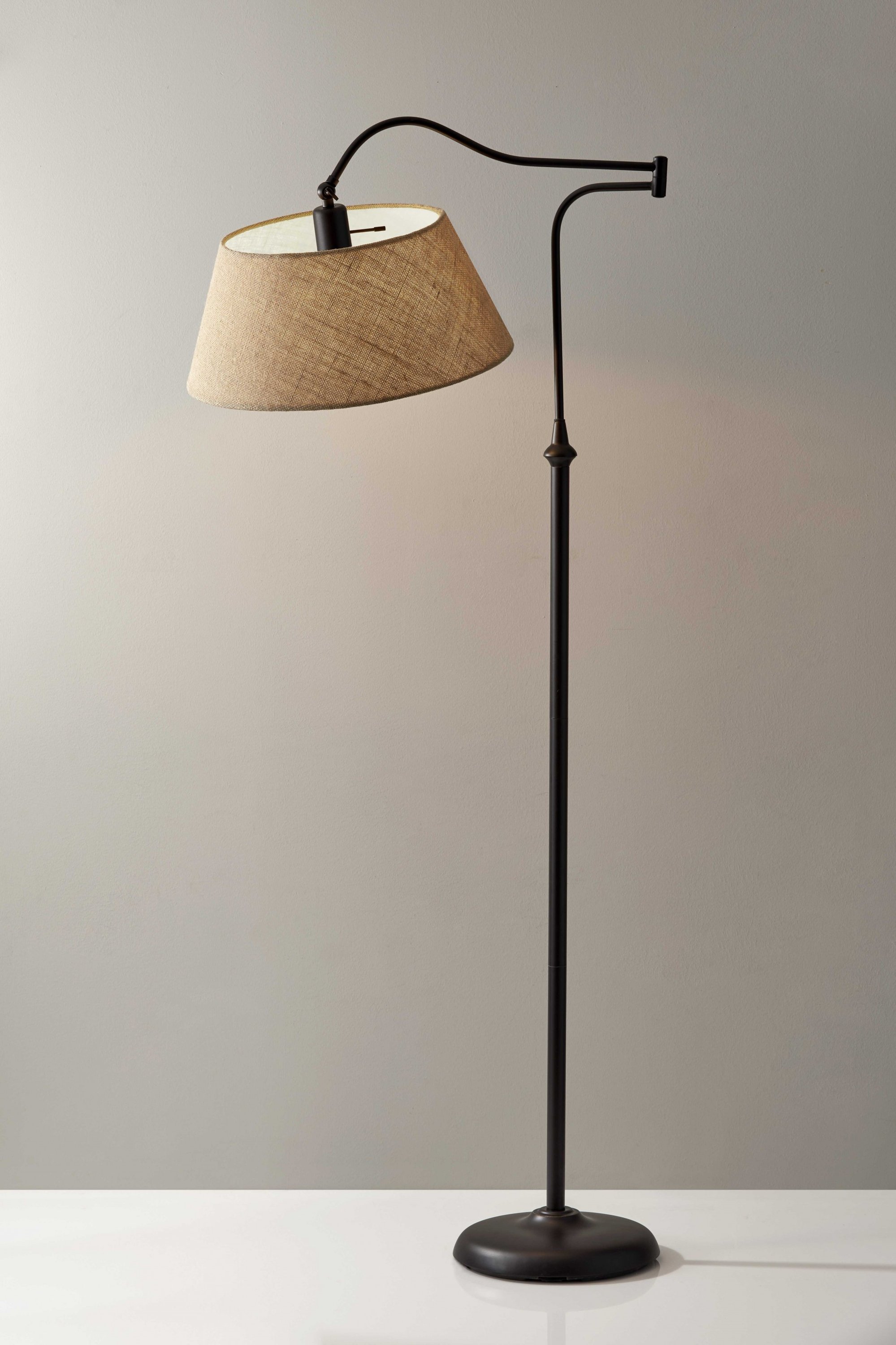 Dark bronze metal floor lamp with adjustable swing arm and textured burlap shade, standing tall at 61 inches.