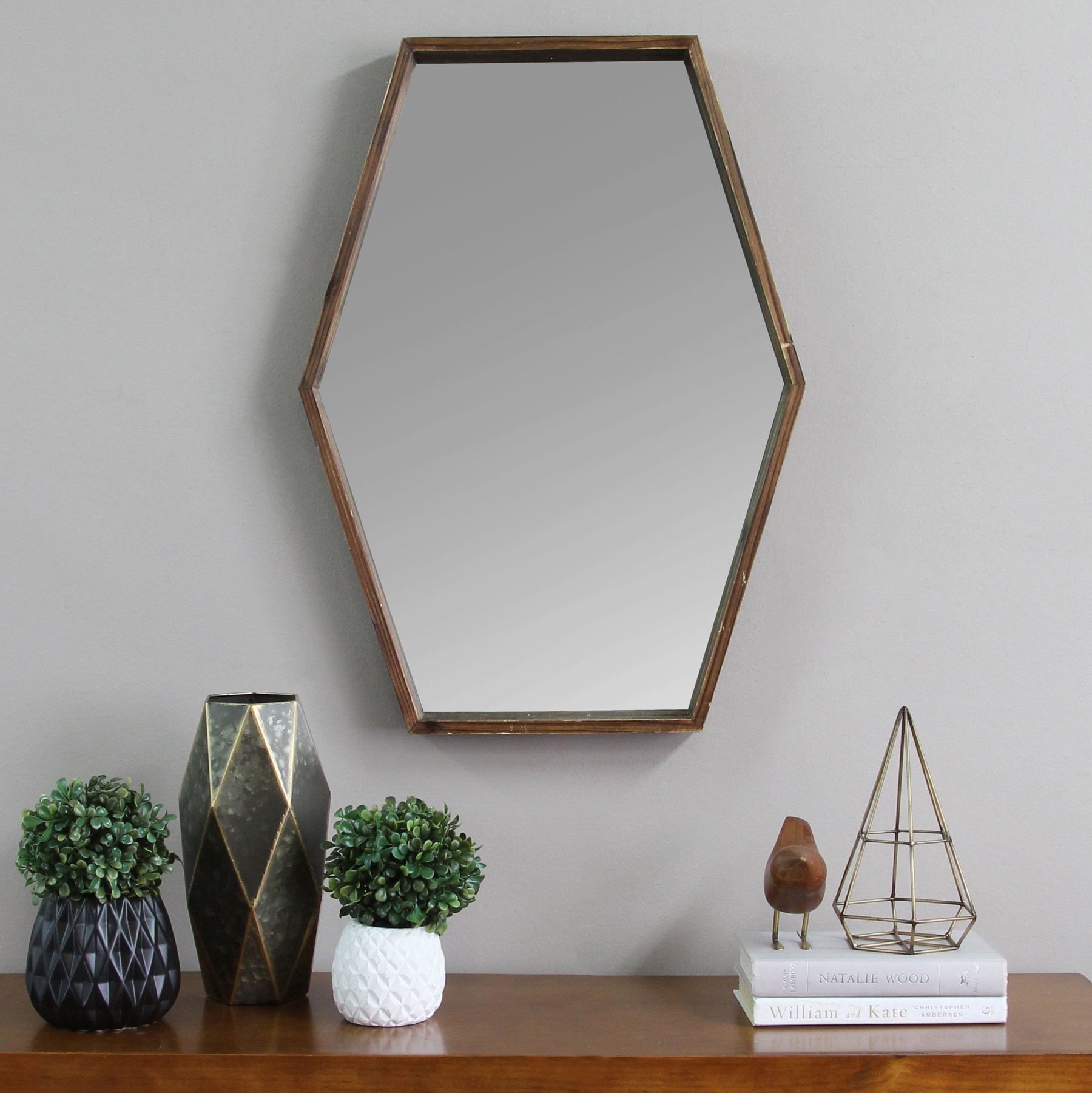 Dark Wood Hexagonal Frame Wall Mirror with a handcrafted design, showcasing a chic hexagonal shape and dark natural wood finish.