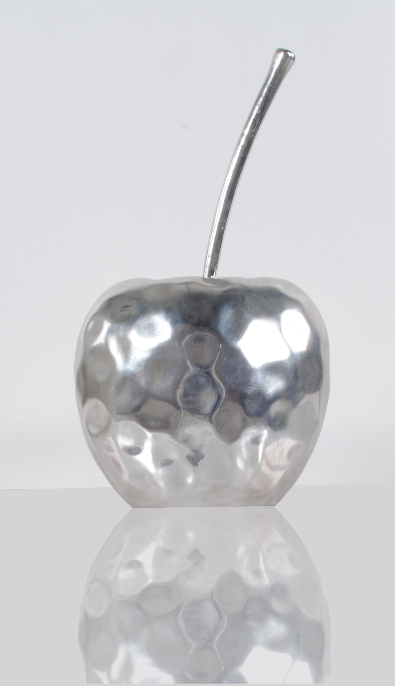 A beautifully crafted hammered finish apple statue made of resin, showcasing a semi-shiny surface and unique texture, ideal for home decor.